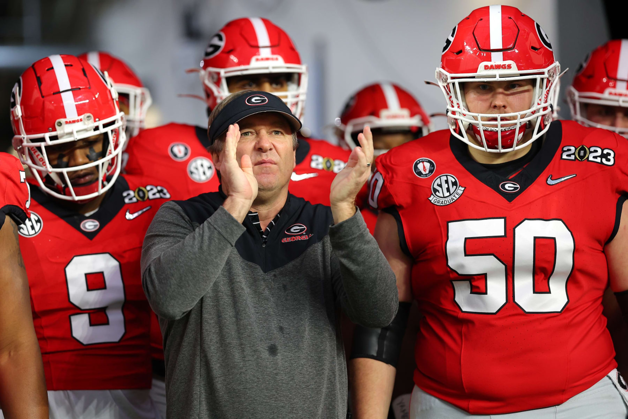 INGLEWOOD, CALIFORNIA - JANUARY 09: Head coach Kirby Smart of the Georgia Bulldogs  prepares to take the field with his players before the College Football Playoff National Championship game against the TCU Horned Frogs at SoFi Stadium on January 09, 2023 in Inglewood, California. (Photo by Kevin C. Cox/Getty Images)