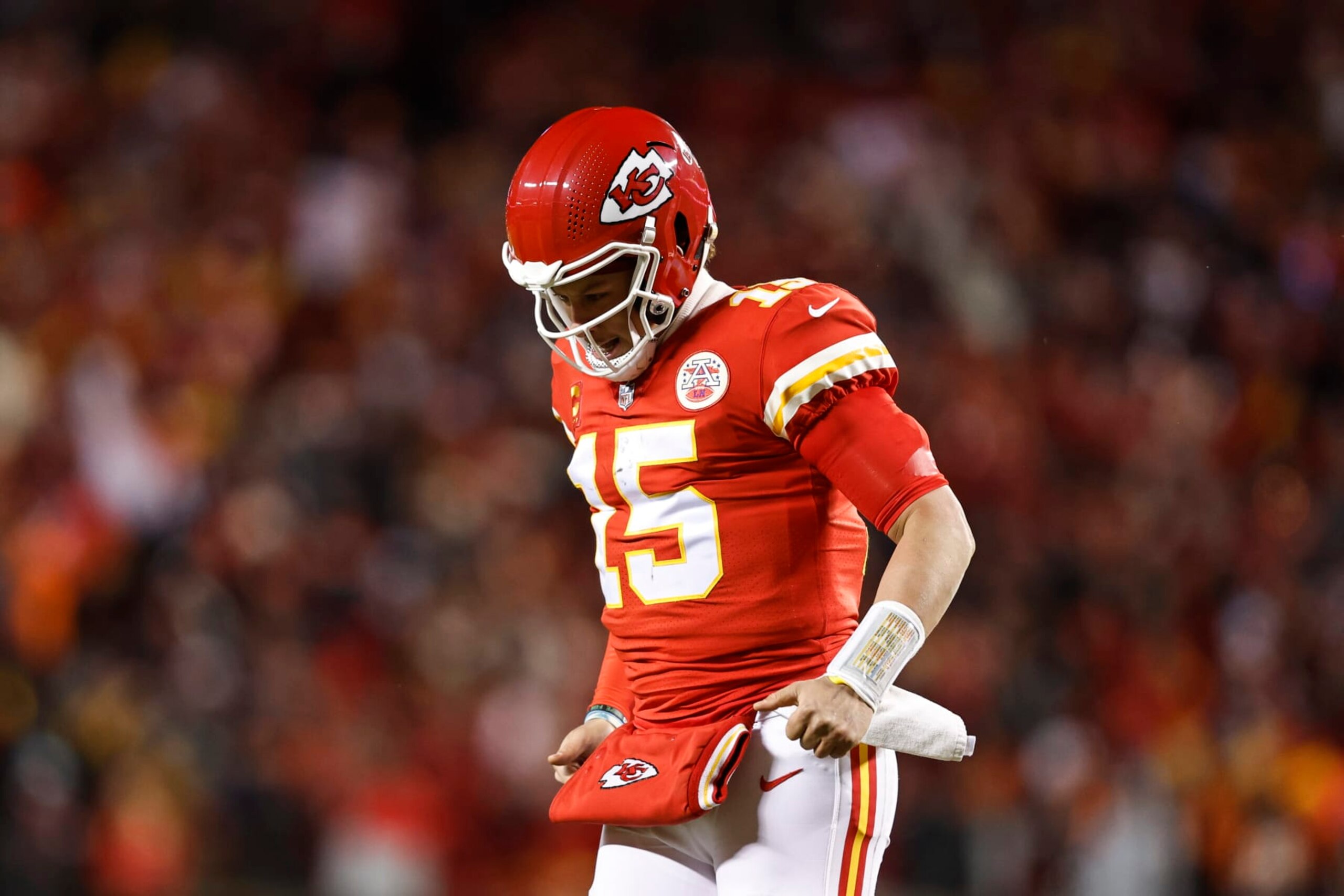 KANSAS CITY, MISSOURI - JANUARY 29: Patrick Mahomes #15 of the Kansas City Chiefs reacts as he runs off the field after passing for a touchdown during the AFC Championship NFL football game between the Kansas City Chiefs and the Cincinnati Bengals at GEHA Field at Arrowhead Stadium on January 29, 2023 in Kansas City, Missouri. (Photo by Michael Owens/Getty Images)