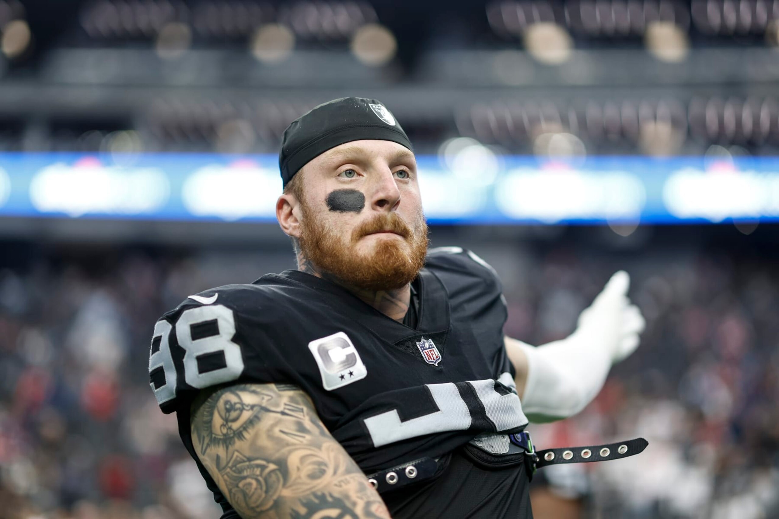 LAS VEGAS, NEVADA - DECEMBER 18: Maxx Crosby #98 of the Las Vegas Raiders stretches prior to an NFL football game between the Las Vegas Raiders and the New England Patriots at Allegiant Stadium on December 18, 2022 in Las Vegas, Nevada. (Photo by Michael Owens/Getty Images)