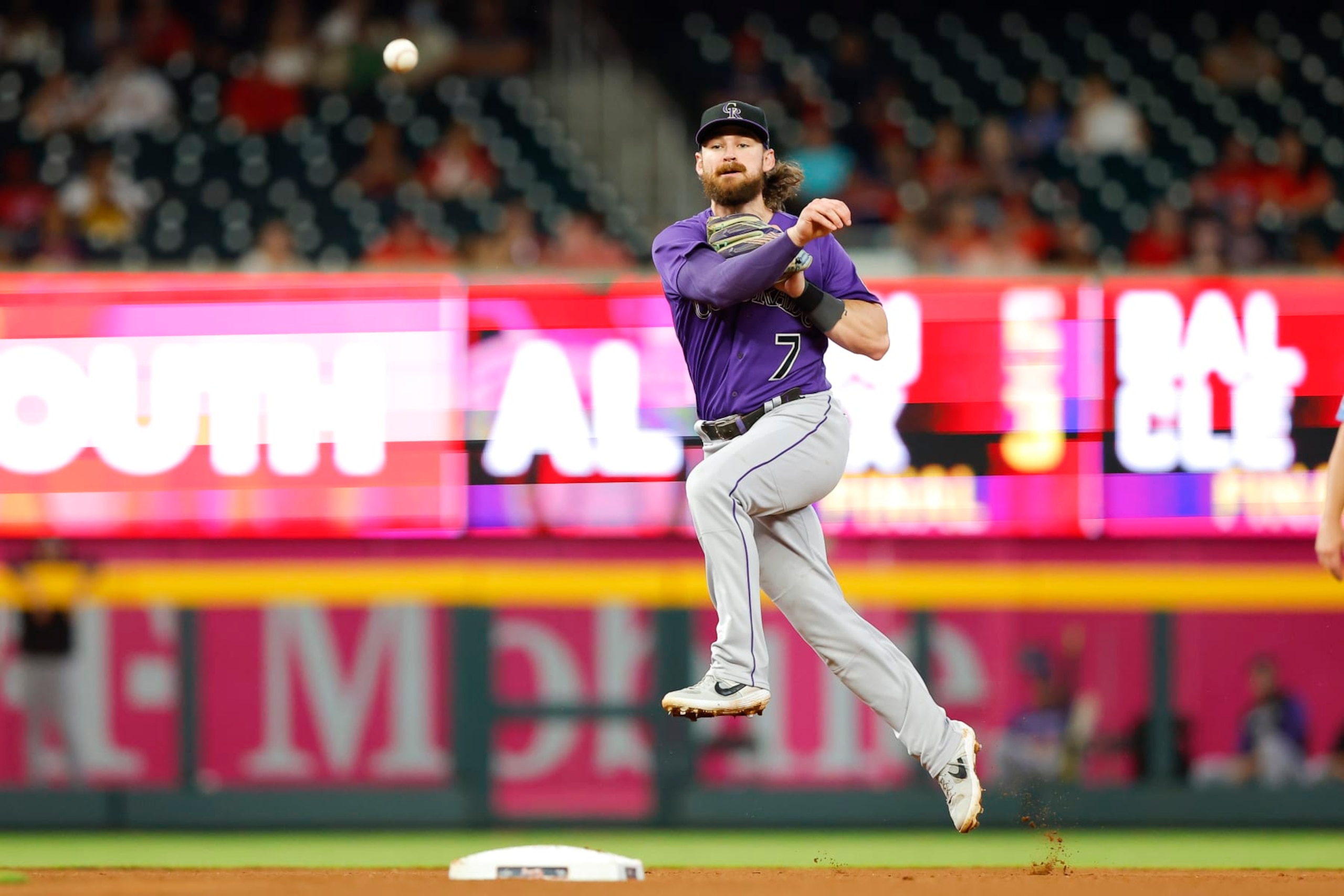 ATLANTA, GA - AUGUST 31: Brendan Rodgers #7 of the Colorado Rockies throws to first during the seventh inning against the Atlanta Braves at Truist Park on August 31, 2022 in Atlanta, Georgia. (Photo by Todd Kirkland/Getty Images) ATLANTA, GA - AUGUST 31: Brendan Rodgers #7 of the Colorado Rockies throws to first during the seventh inning against the Atlanta Braves at Truist Park on August 31, 2022 in Atlanta, Georgia. (Photo by Todd Kirkland/Getty Images)