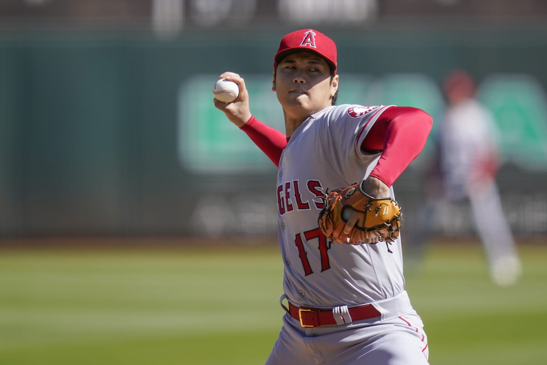 Los Angeles Angels' Shohei Ohtani pitches against the Oakland Athletics during the first inning of a baseball game in Oakland, Calif., Wednesday, Oct. 5, 2022. (AP Photo/Godofredo A. Vásquez)