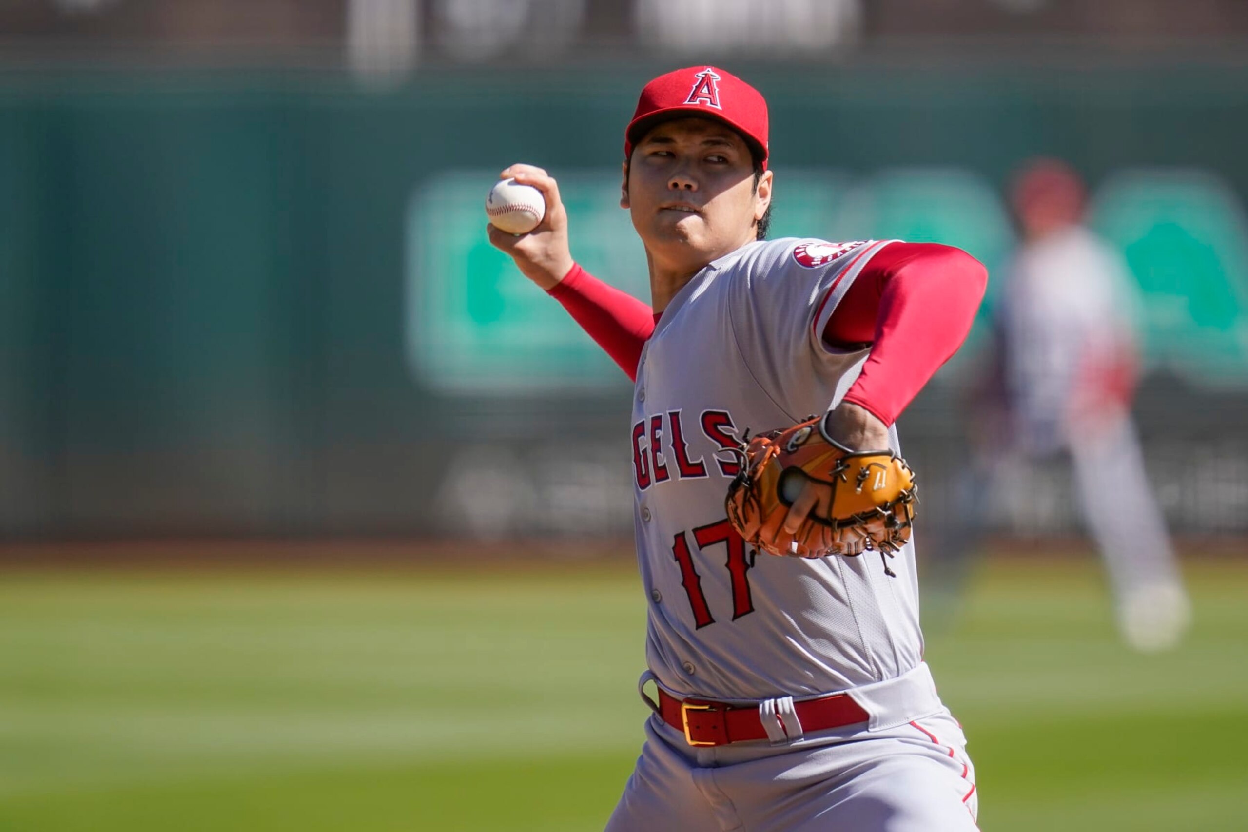Los Angeles Angels' Shohei Ohtani pitches against the Oakland Athletics during the first inning of a baseball game in Oakland, Calif., Wednesday, Oct. 5, 2022. (AP Photo/Godofredo A. Vásquez)
