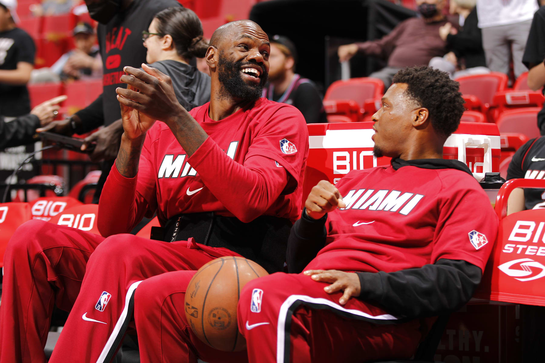 MIAMI, FL - MARCH 23: Dewayne Dedmon #21 talks to Kyle Lowry #7 of the Miami Heat before the game against the Golden State Warriors on March 23, 2022 at FTX Arena in Miami, Florida. NOTE TO USER: User expressly acknowledges and agrees that, by downloading and or using this Photograph, user is consenting to the terms and conditions of the Getty Images License Agreement. Mandatory Copyright Notice: Copyright 2022 NBAE (Photo by Issac Baldizon/NBAE via Getty Images)