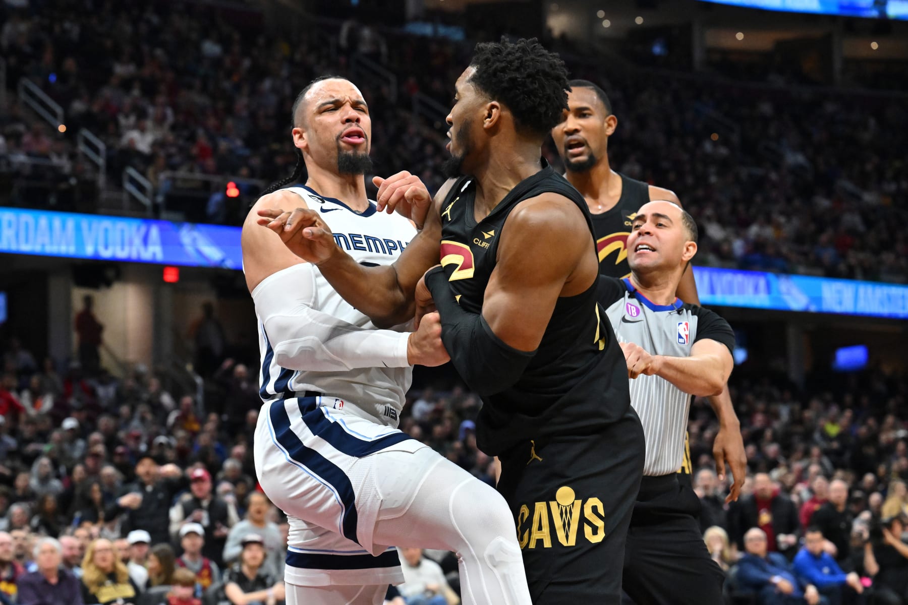CLEVELAND, OHIO - FEBRUARY 02: Dillon Brooks #24 of the Memphis Grizzlies fights with Donovan Mitchell #45 of the Cleveland Cavaliers during the third quarter at Rocket Mortgage Fieldhouse on February 02, 2023 in Cleveland, Ohio. Both players were ejected.The Cavaliers defeated the Grizzlies 128-113. NOTE TO USER: User expressly acknowledges and agrees that, by downloading and or using this photograph, User is consenting to the terms and conditions of the Getty Images License Agreement. (Photo by Jason Miller/Getty Images)