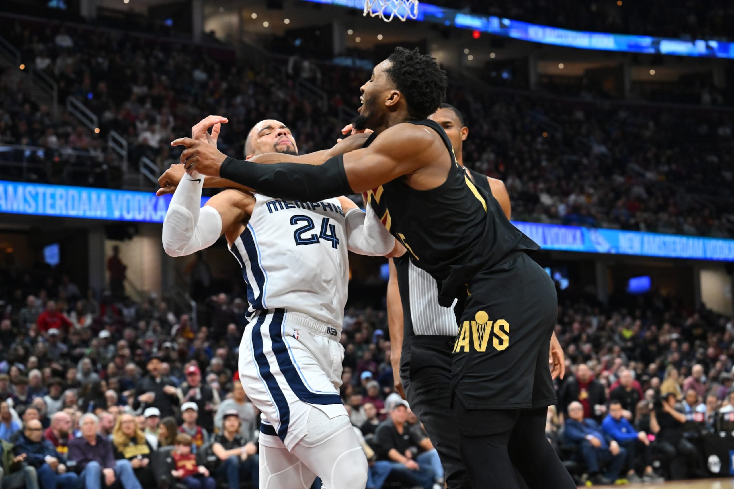 CLEVELAND, OHIO - FEBRUARY 02: Dillon Brooks #24 of the Memphis Grizzlies fights with Donovan Mitchell #45 of the Cleveland Cavaliers during the third quarter at Rocket Mortgage Fieldhouse on February 02, 2023 in Cleveland, Ohio. Both players were ejected.The Cavaliers defeated the Grizzlies 128-113. NOTE TO USER: User expressly acknowledges and agrees that, by downloading and or using this photograph, User is consenting to the terms and conditions of the Getty Images License Agreement. (Photo by Jason Miller/Getty Images)