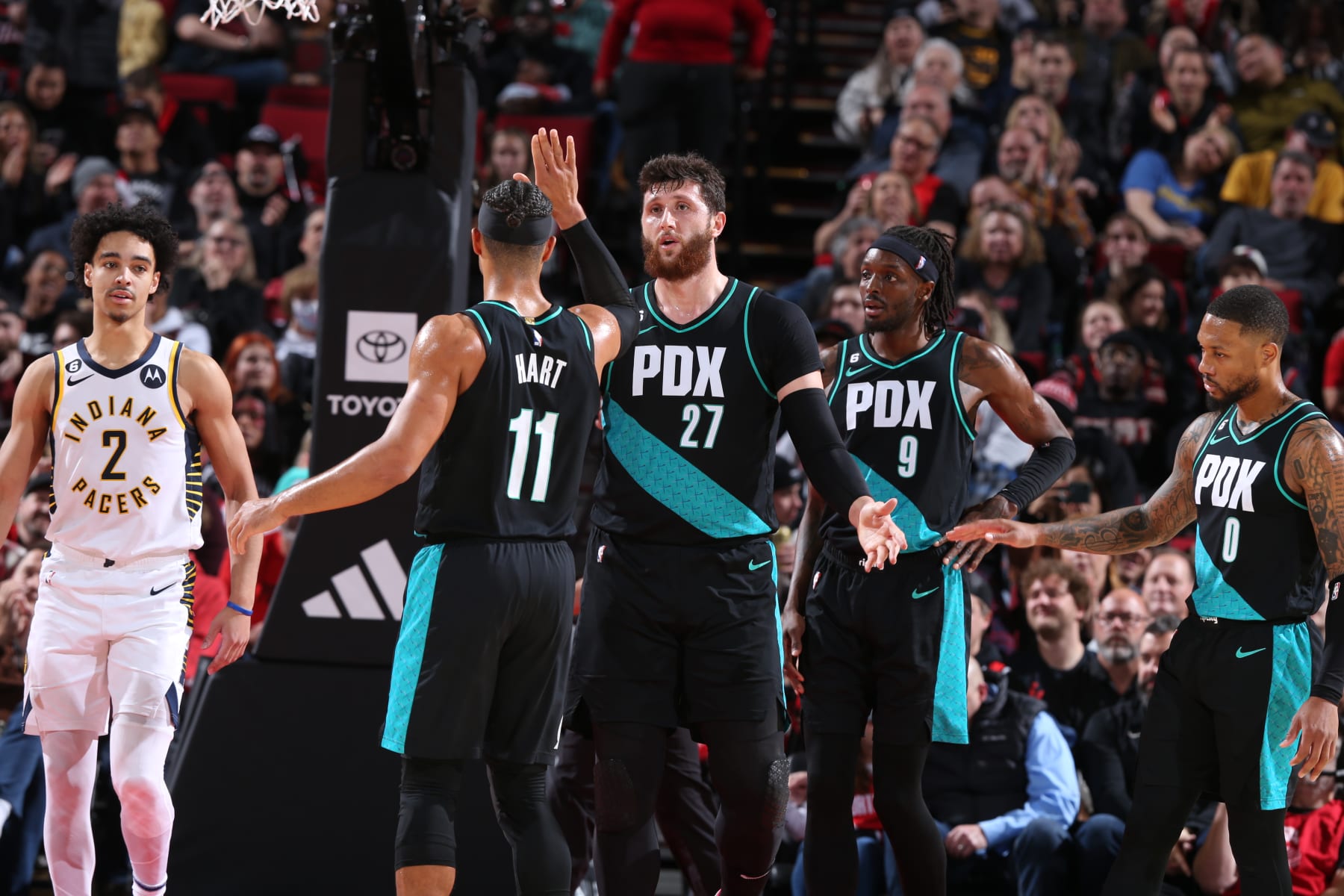 PORTLAND, OR - DECEMBER 4: Josh Hart #11 high fives Jusuf Nurkic #27 of the Portland Trail Blazers during the game against the Indiana Pacers on December 4, 2022 at the Moda Center Arena in Portland, Oregon. NOTE TO USER: User expressly acknowledges and agrees that, by downloading and or using this photograph, user is consenting to the terms and conditions of the Getty Images License Agreement. Mandatory Copyright Notice: Copyright 2022 NBAE (Photo by Sam Forencich/NBAE via Getty Images)