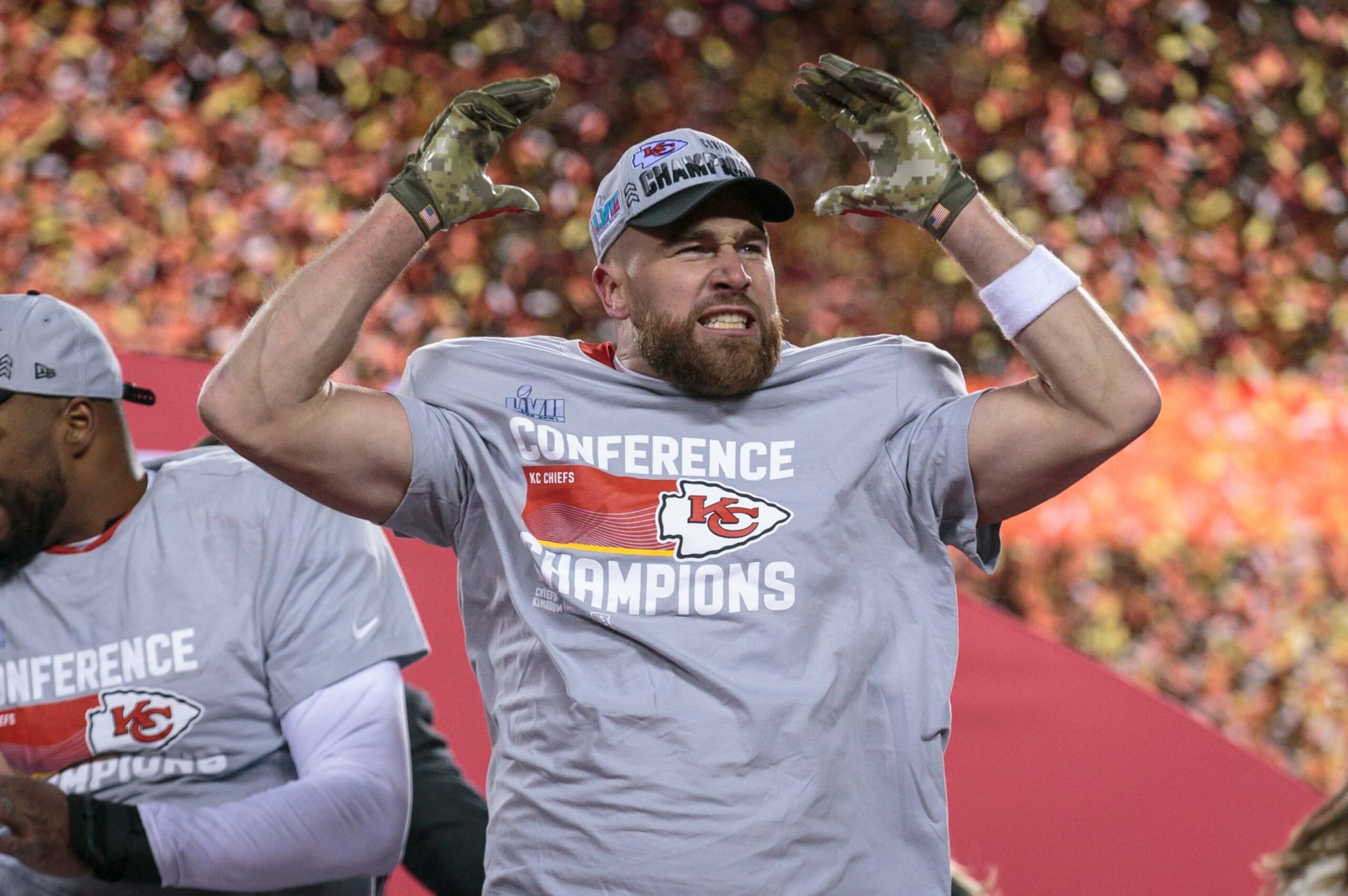 KANSAS CITY, MO - JANUARY 29: Kansas City Chiefs tight end Travis Kelce (87) celebrates on the trophy podium after the game against the Cincinnati Bengals on January 29th, 2023 at Arrowhead Stadium in Kansas City, Missouri. (Photo by William Purnell/Icon Sportswire via Getty Images)