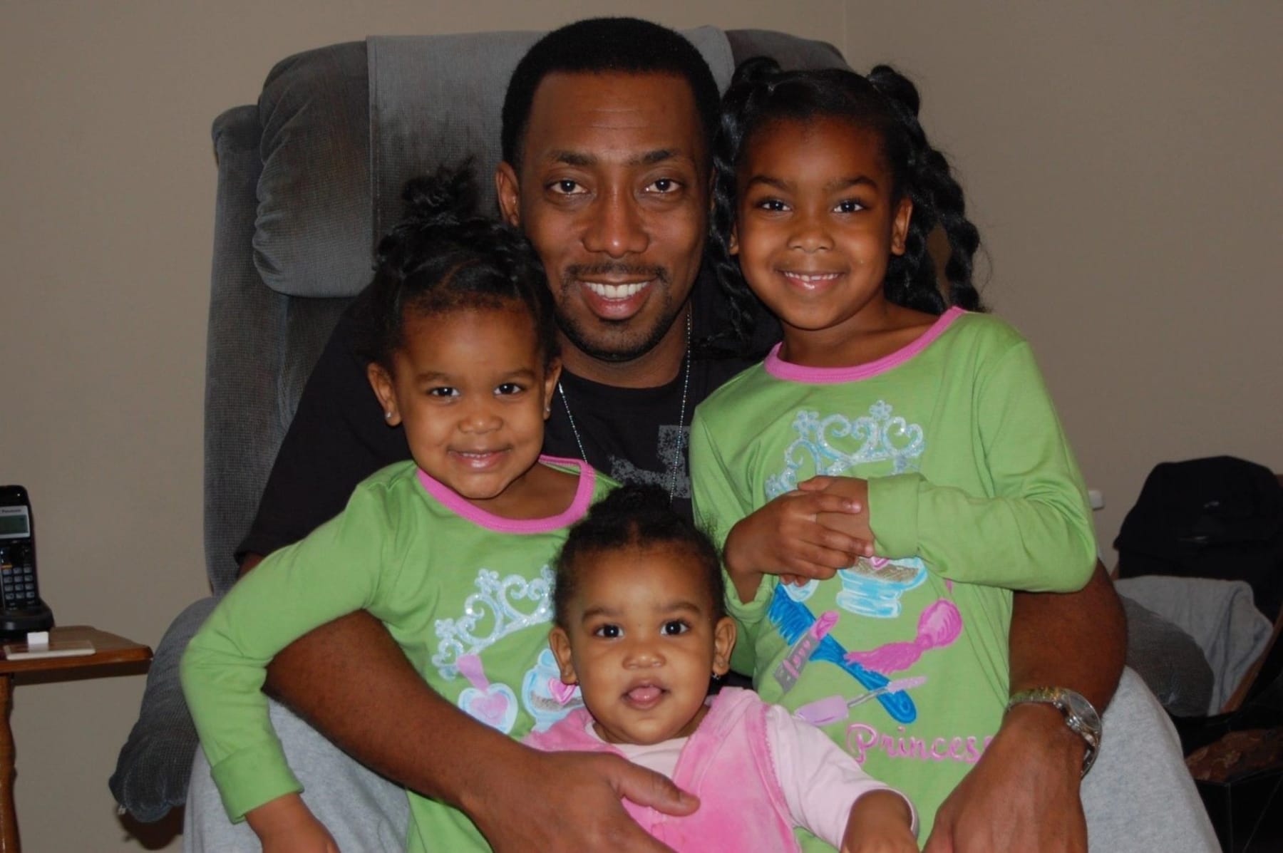 Chris Price with his three daughters, Frankie (right), Morgan (left) and Kristin. 