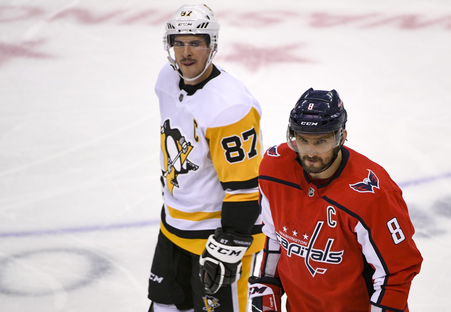 WASHINGTON, DC - NOVEMBER 07: Pittsburgh Penguins center Sidney Crosby (87) skate with Washington Capitals left wing Alex Ovechkin (8) in the third period on November 7, 2018, at the Capital One Arena in Washington, D.C. The Washington Capitals defeated the Pittsburgh Penguins, 2-1.  (Photo by Mark Goldman/Icon Sportswire via Getty Images)