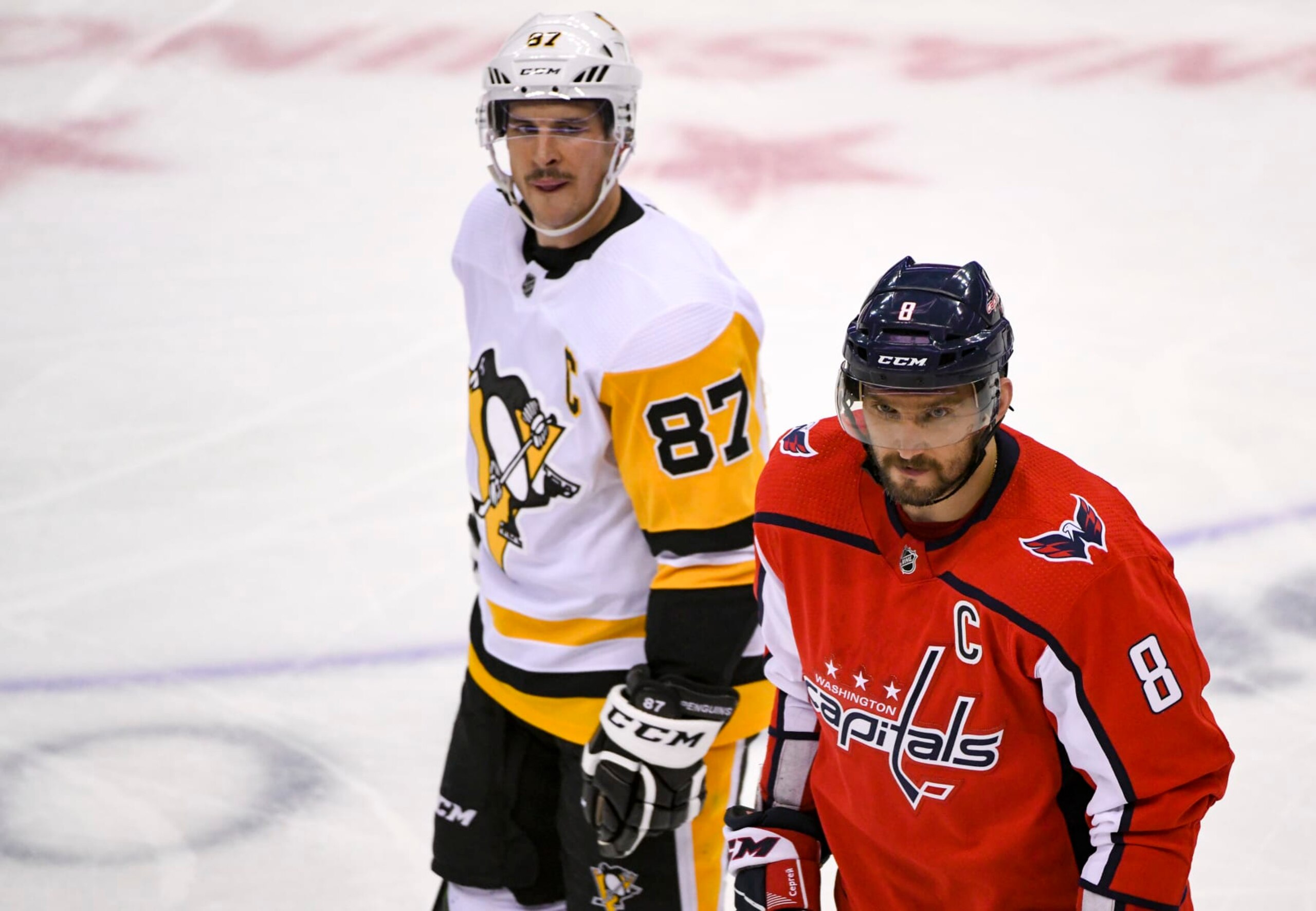 WASHINGTON, DC - NOVEMBER 07: Pittsburgh Penguins center Sidney Crosby (87) skate with Washington Capitals left wing Alex Ovechkin (8) in the third period on November 7, 2018, at the Capital One Arena in Washington, D.C. The Washington Capitals defeated the Pittsburgh Penguins, 2-1.  (Photo by Mark Goldman/Icon Sportswire via Getty Images)