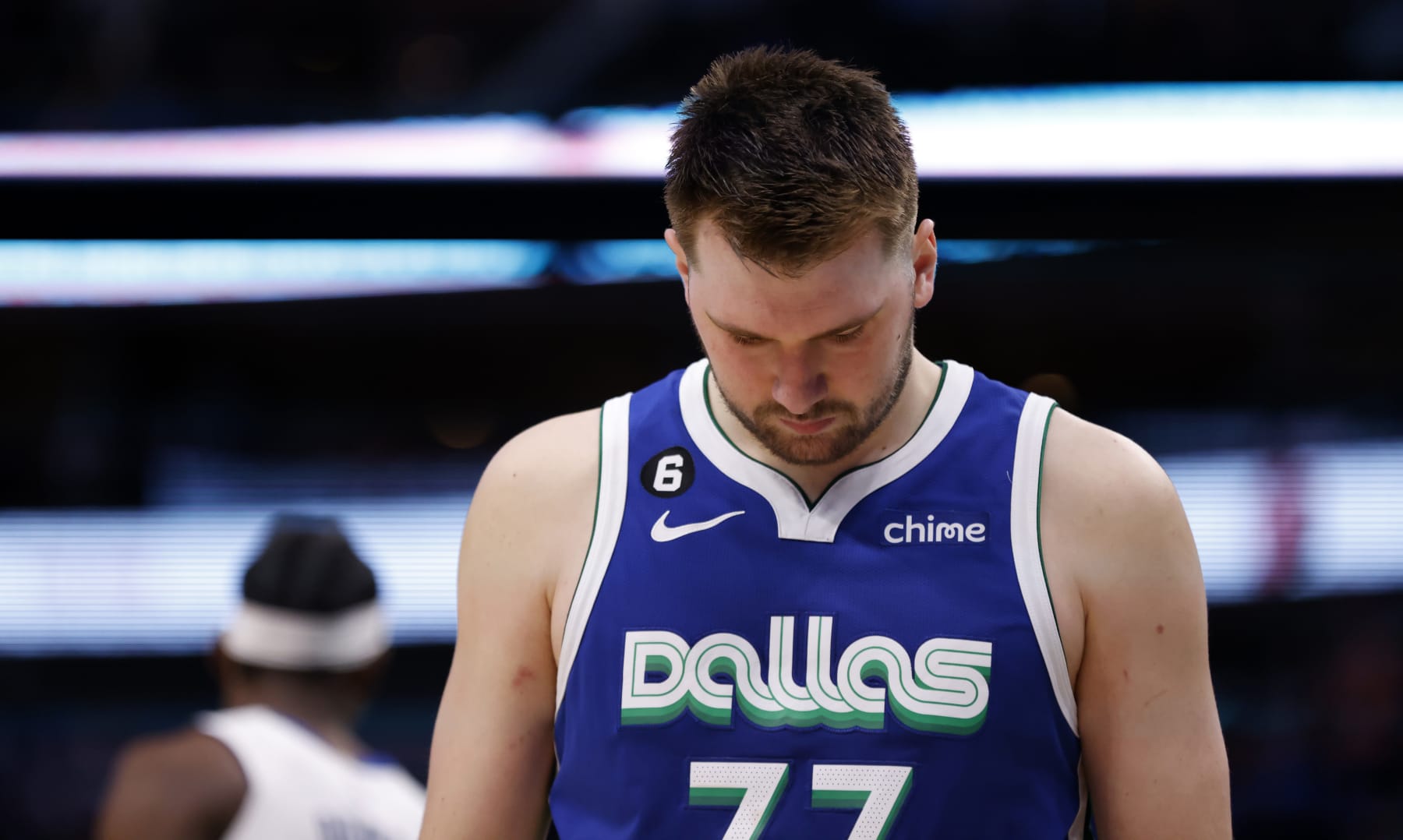 DALLAS, TX - JANUARY 30: Luka Doncic #77 of the Dallas Mavericks looks down against the Detroit Pistons in the second half at American Airlines Center on January 30, 2023 in Dallas, Texas. The Mavericks won 111-105. NOTE TO USER: User expressly acknowledges and agrees that, by downloading and or using this photograph, User is consenting to the terms and conditions of the Getty Images License Agreement. (Photo by Ron Jenkins/Getty Images)