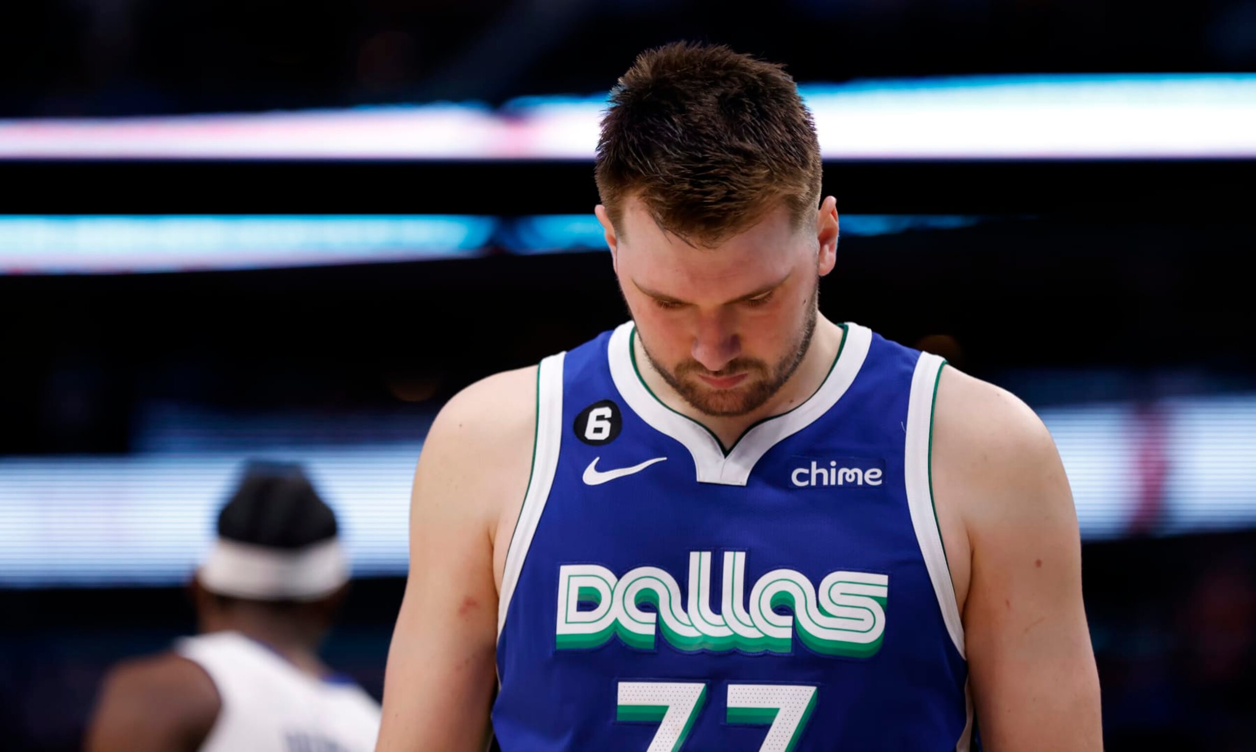 DALLAS, TX - JANUARY 30: Luka Doncic #77 of the Dallas Mavericks looks down against the Detroit Pistons in the second half at American Airlines Center on January 30, 2023 in Dallas, Texas. The Mavericks won 111-105. NOTE TO USER: User expressly acknowledges and agrees that, by downloading and or using this photograph, User is consenting to the terms and conditions of the Getty Images License Agreement. (Photo by Ron Jenkins/Getty Images)