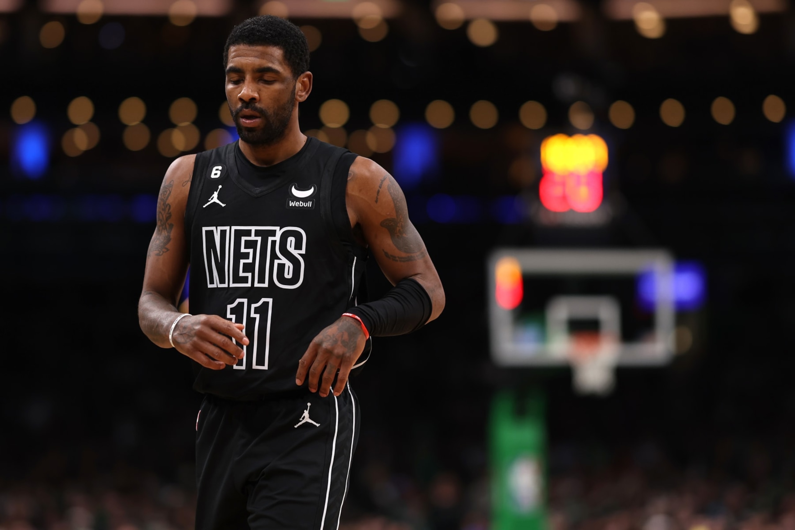 BOSTON, MASSACHUSETTS - FEBRUARY 01: Kyrie Irving #11 of the Brooklyn Nets looks on during the first half against the Boston Celtics at TD Garden on February 01, 2023 in Boston, Massachusetts. NOTE TO USER: User expressly acknowledges and agrees that, by downloading and or using this photograph, User is consenting to the terms and conditions of the Getty Images License Agreement. (Photo by Maddie Meyer/Getty Images)