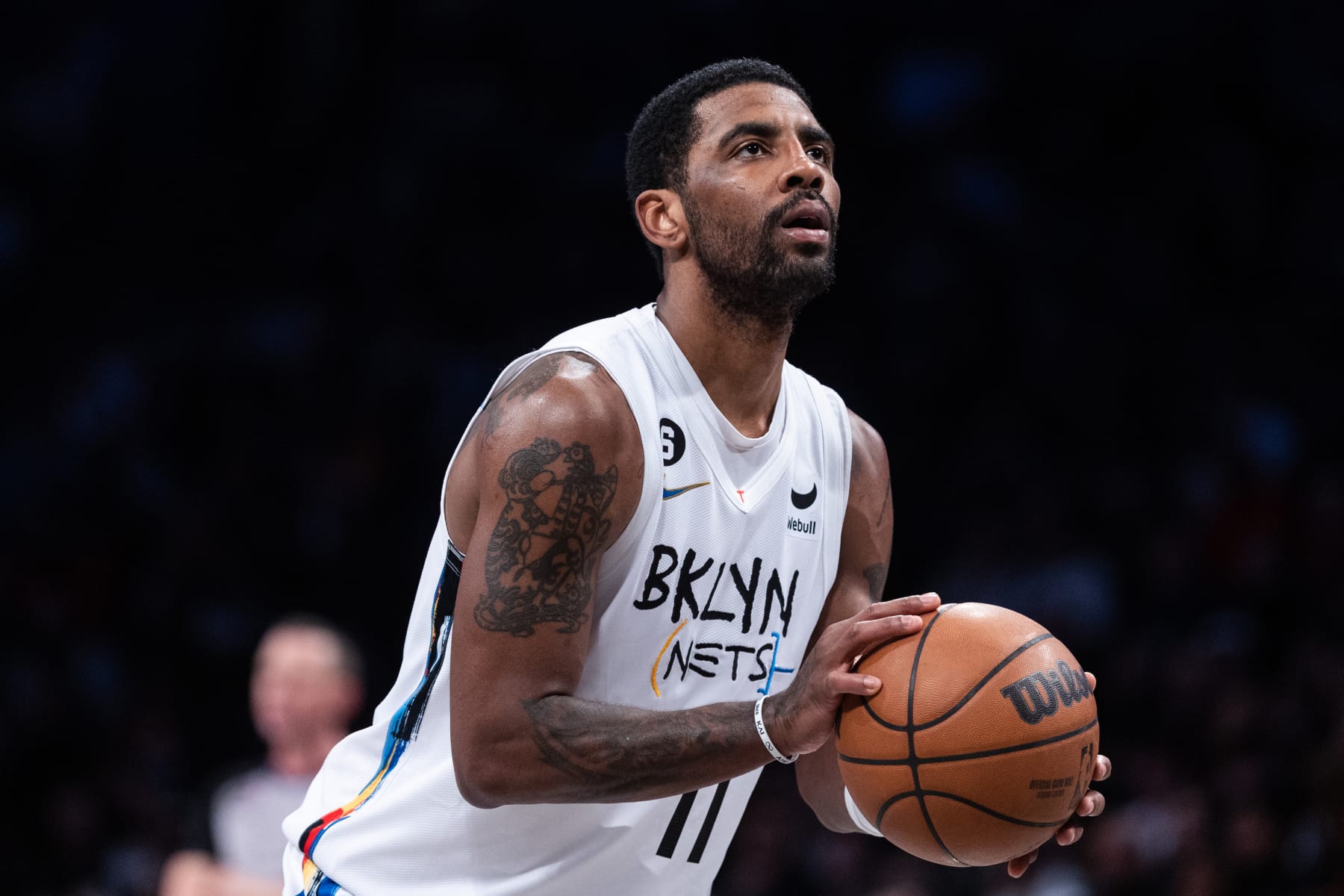 NEW YORK, NEW YORK - JANUARY 28: Kyrie Irving #11 of the Brooklyn Nets shoots a free throw during the second quarter of the game against the New York Knicks at Barclays Center on January 28, 2023 in New York City. NOTE TO USER: User expressly acknowledges and agrees that, by downloading and or using this photograph, User is consenting to the terms and conditions of the Getty Images License Agreement. (Photo by Dustin Satloff/Getty Images)