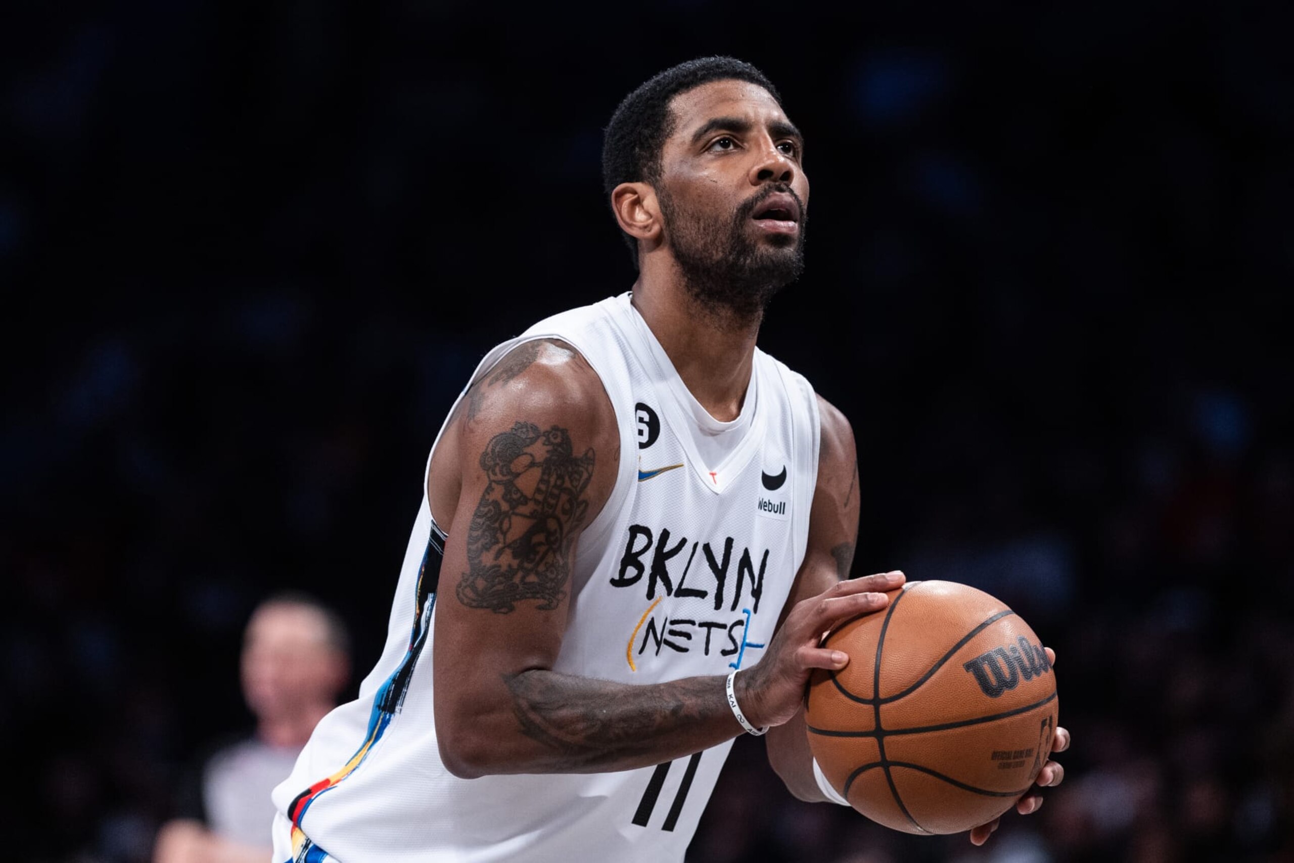 NEW YORK, NEW YORK - JANUARY 28: Kyrie Irving #11 of the Brooklyn Nets shoots a free throw during the second quarter of the game against the New York Knicks at Barclays Center on January 28, 2023 in New York City. NOTE TO USER: User expressly acknowledges and agrees that, by downloading and or using this photograph, User is consenting to the terms and conditions of the Getty Images License Agreement. (Photo by Dustin Satloff/Getty Images)
