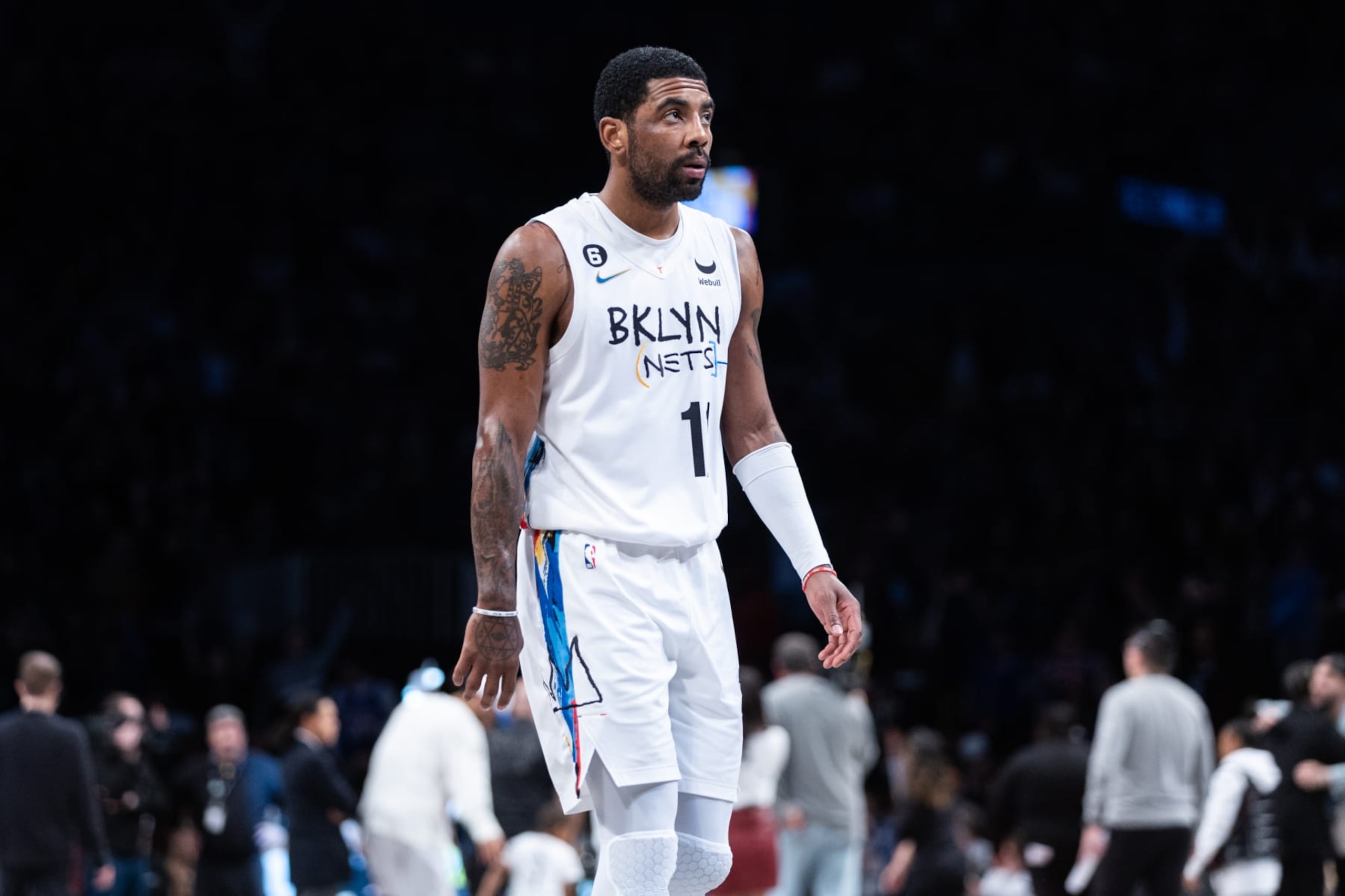 NEW YORK, NEW YORK - JANUARY 28: Kyrie Irving #11 of the Brooklyn Nets looks on during the first quarter of the game against the New York Knicks at Barclays Center on January 28, 2023 in New York City. NOTE TO USER: User expressly acknowledges and agrees that, by downloading and or using this photograph, User is consenting to the terms and conditions of the Getty Images License Agreement. (Photo by Dustin Satloff/Getty Images)