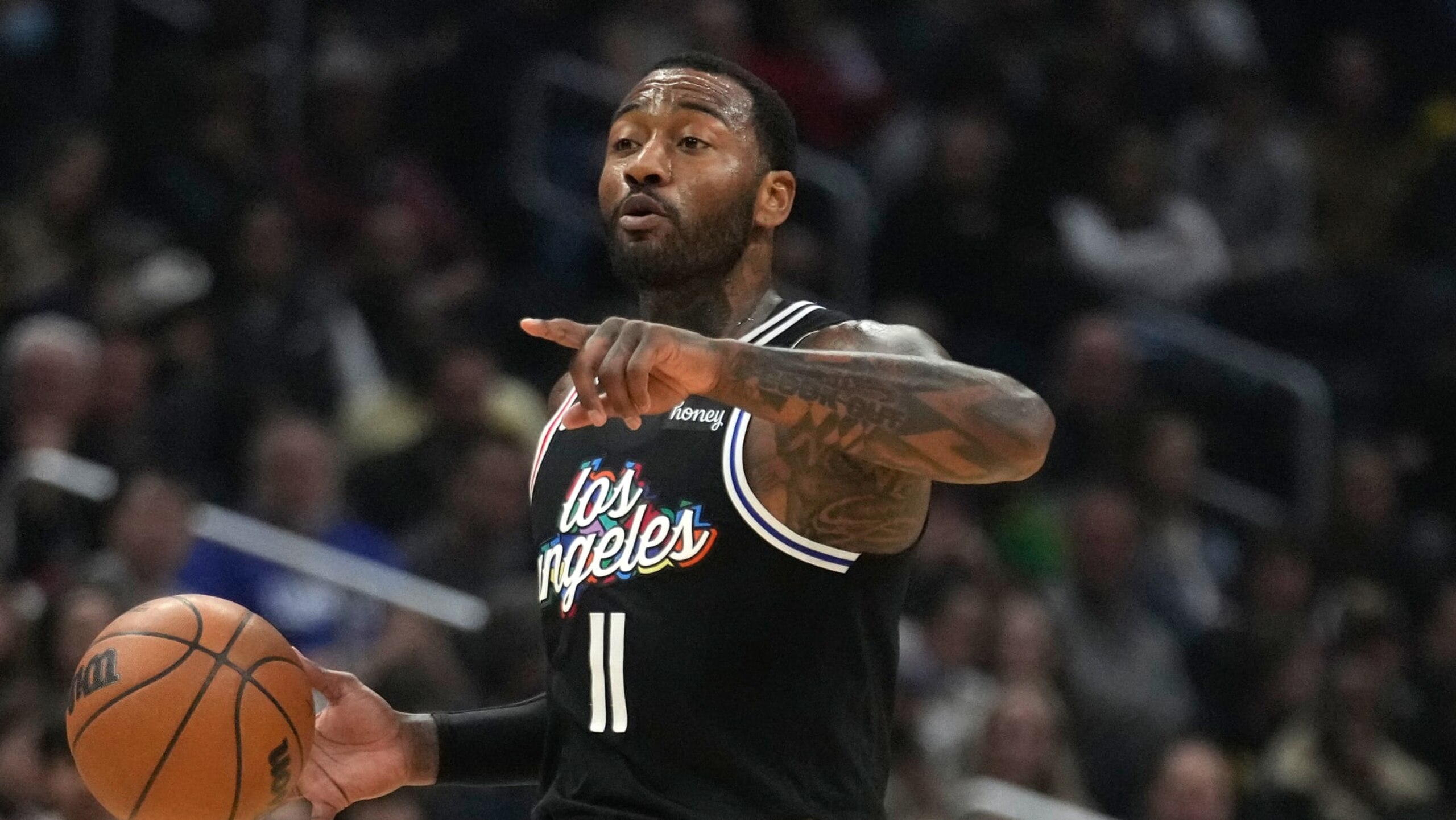 Los Angeles Clippers guard John Wall dribbles during an NBA basketball game against the Denver Nuggets Friday, Jan. 13, 2023, in Los Angeles. (AP Photo/Marcio Jose Sanchez)