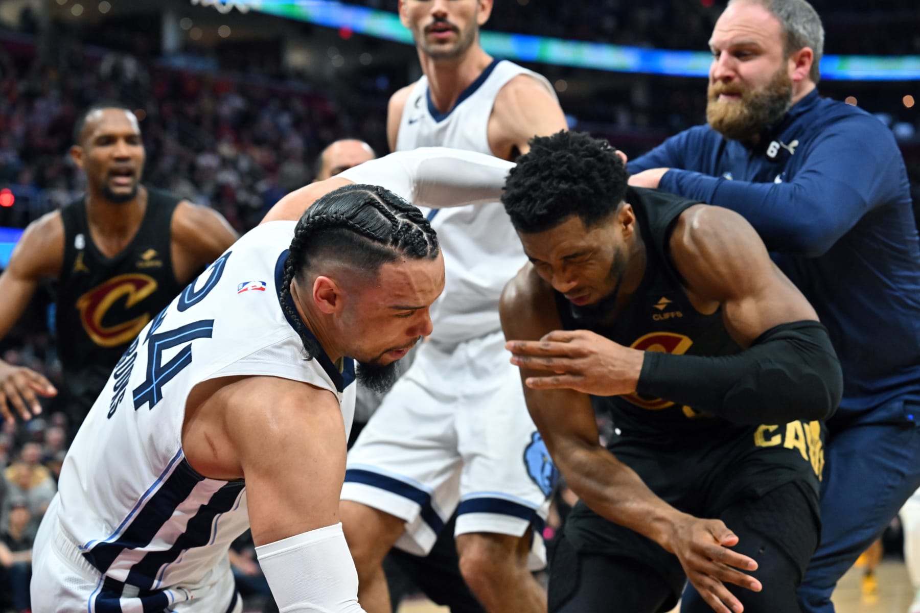 CLEVELAND, OHIO - FEBRUARY 02: Dillon Brooks #24 of the Memphis Grizzlies fights with Donovan Mitchell #45 of the Cleveland Cavaliers during the third quarter at Rocket Mortgage Fieldhouse on February 02, 2023 in Cleveland, Ohio. Both players were ejected.The Cavaliers defeated the Grizzlies 128-113. NOTE TO USER: User expressly acknowledges and agrees that, by downloading and or using this photograph, User is consenting to the terms and conditions of the Getty Images License Agreement. (Photo by Jason Miller/Getty Images)