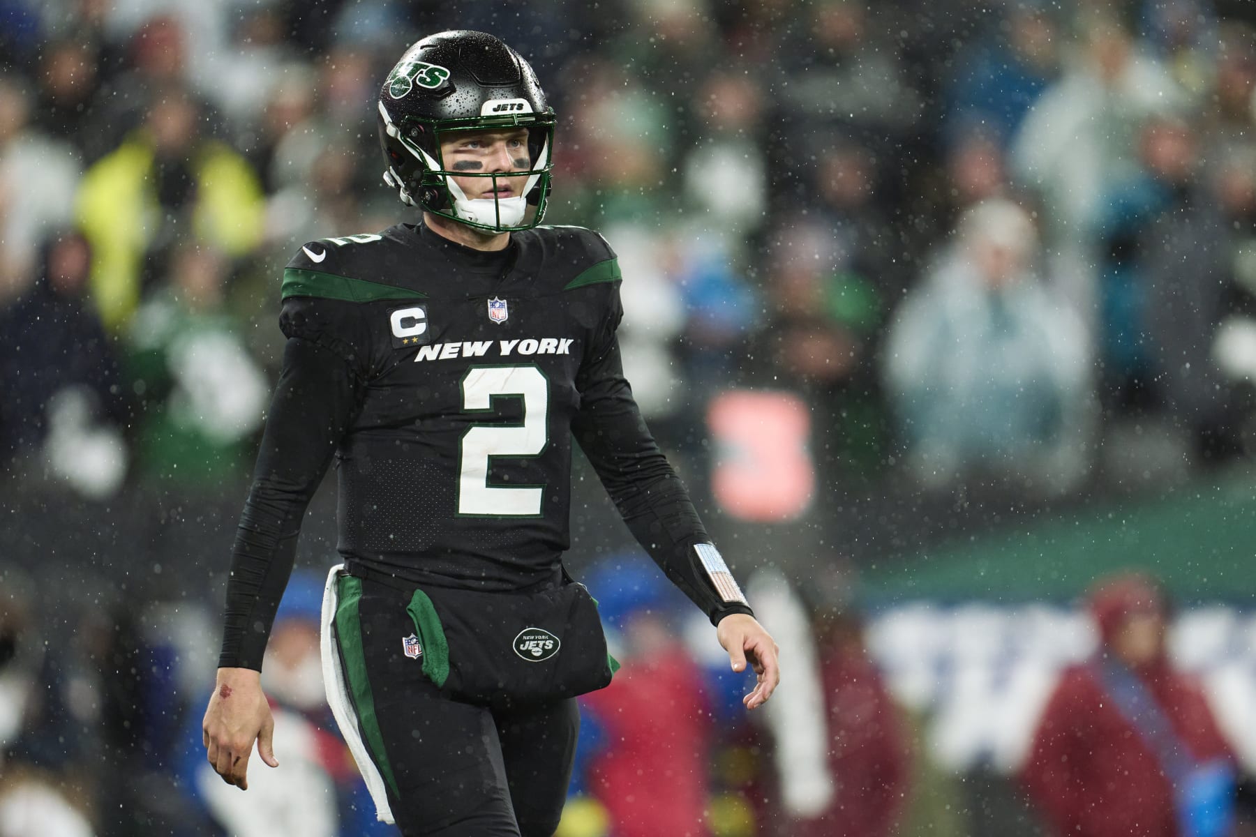 EAST RUTHERFORD, NJ - DECEMBER 22: Zach Wilson #2 of the New York Jets walks to the sideline against the Jacksonville Jaguars during the first half at MetLife Stadium on December 22, 2022 in East Rutherford, New Jersey. (Photo by Cooper Neill/Getty Images)
