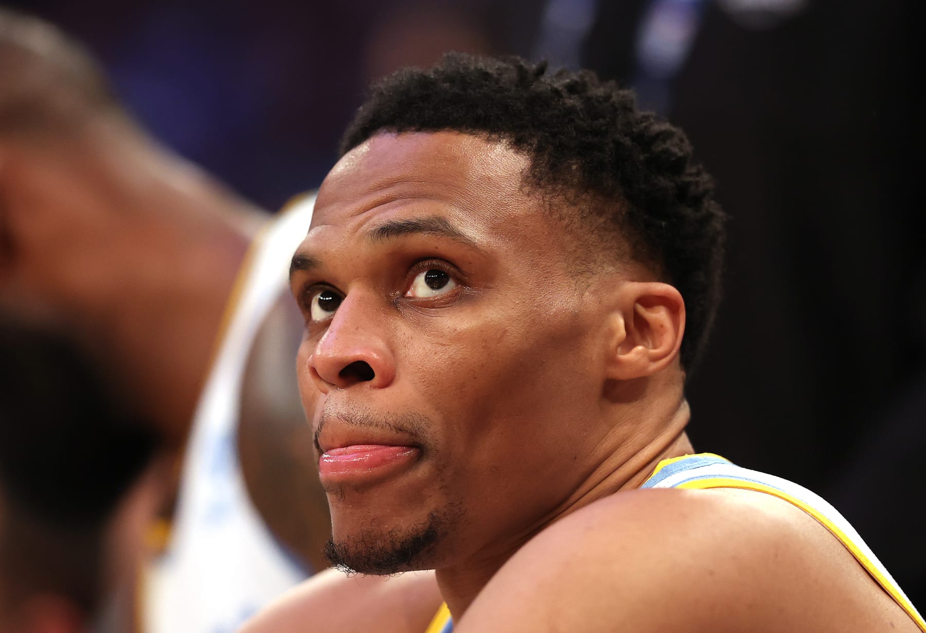 NEW YORK, NEW YORK - JANUARY 31: Russell Westbrook #0 of the Los Angeles Lakers looks on from the bench in the third quarter against the New York Knicks at Madison Square Garden on January 31, 2023 in New York City. The Los Angeles Lakers defeated the New York Knicks 129-123 in overtime. NOTE TO USER: User expressly acknowledges and agrees that, by downloading and or using this photograph, User is consenting to the terms and conditions of the Getty Images License Agreement. (Photo by Elsa/Getty Images)