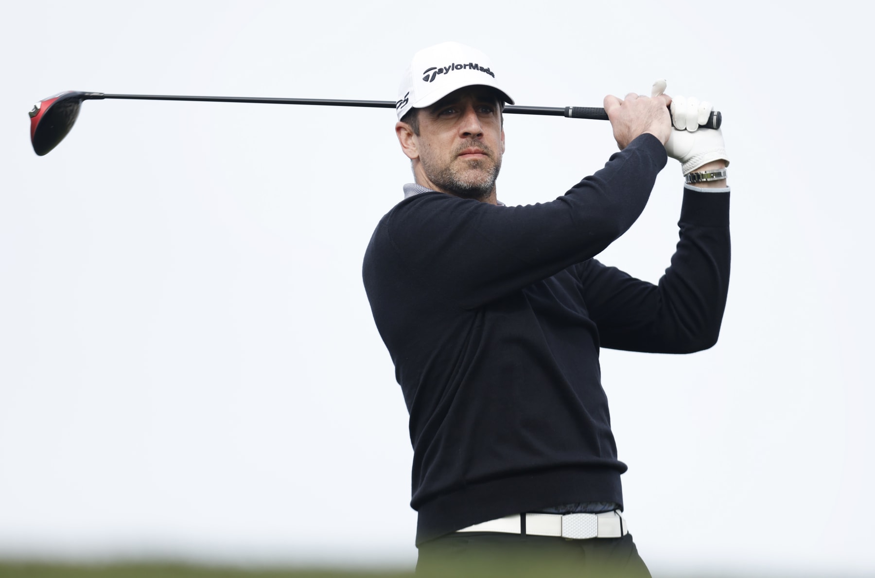 PEBBLE BEACH, CALIFORNIA - FEBRUARY 02: Aaron Rodgers plays his shot from the sixth tee during the first round of the AT&T Pebble Beach Pro-Am at Spyglass Hill Golf Course on February 02, 2023 in Pebble Beach, California. (Photo by Jed Jacobsohn/Getty Images)