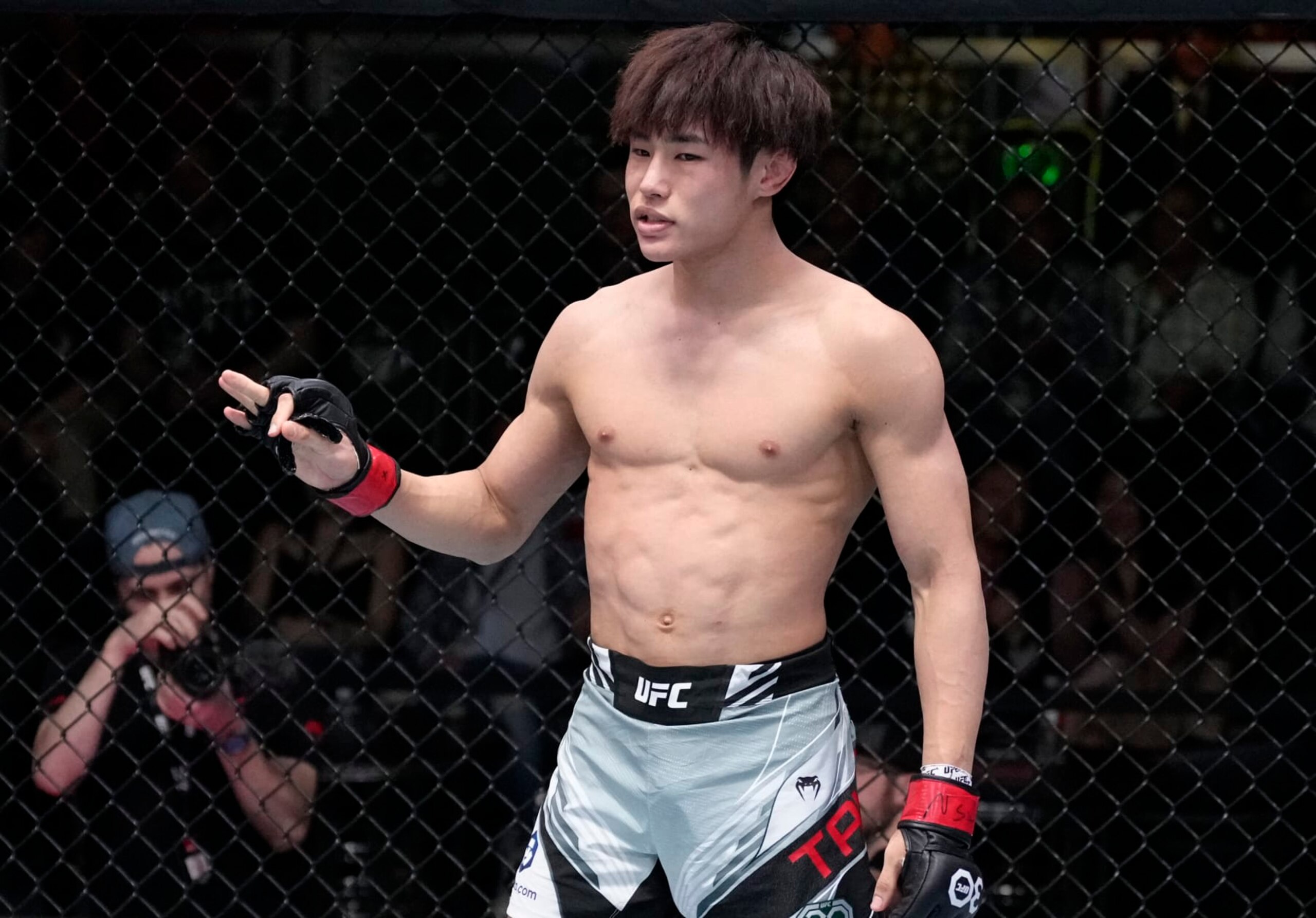 LAS VEGAS, NEVADA - FEBRUARY 04: Tatsuro Taira of Japan celebrates after his victory over Jesus Aguilar of Mexico in a flyweight fight during the UFC Fight Night event at UFC APEX on February 04, 2023 in Las Vegas, Nevada. (Photo by Jeff Bottari/Zuffa LLC via Getty Images)