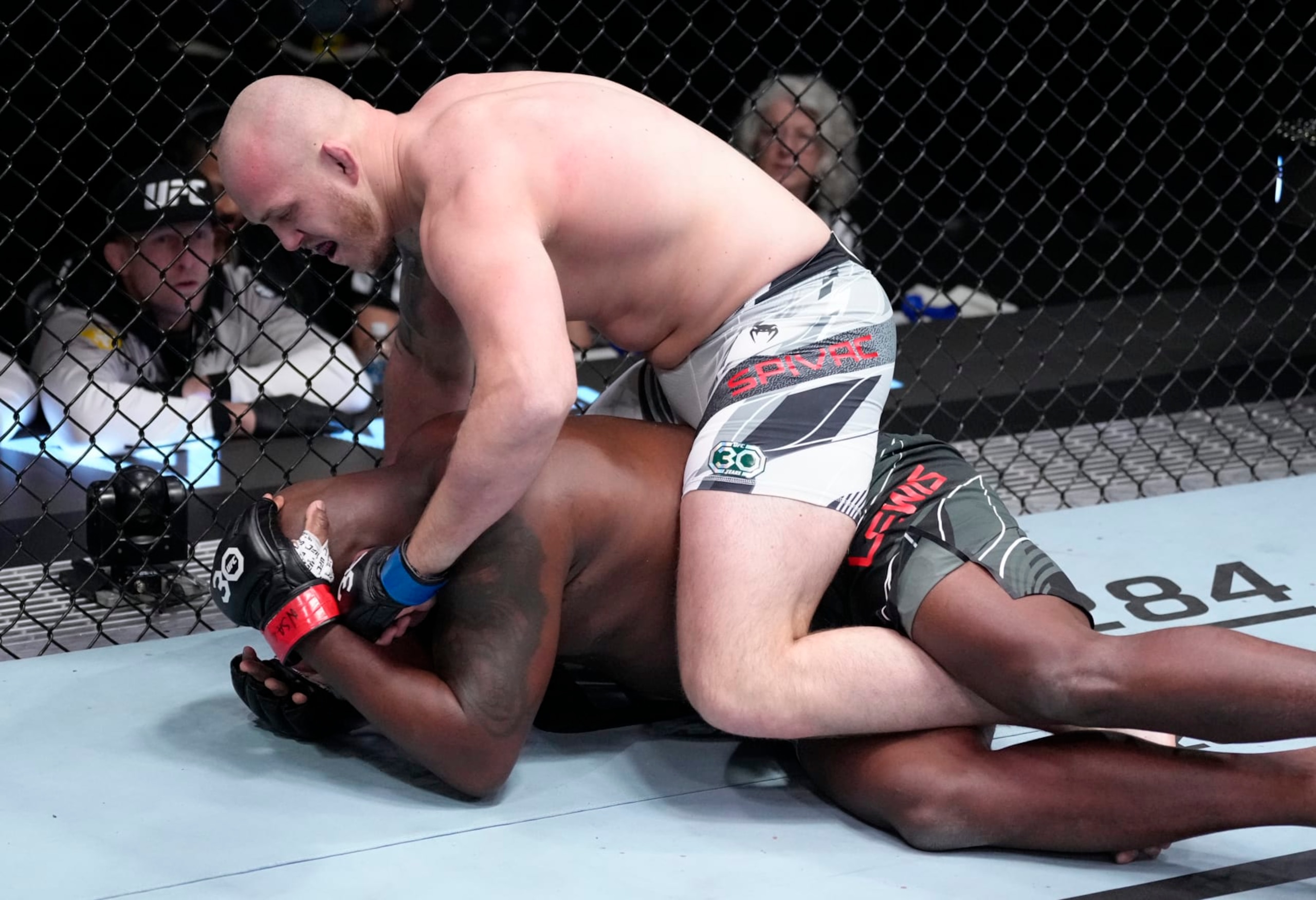 LAS VEGAS, NEVADA - FEBRUARY 04: (R-L) Serghei Spivac of Moldova punches Derrick Lewis in a heavyweight fight during the UFC Fight Night event at UFC APEX on February 04, 2023 in Las Vegas, Nevada. (Photo by Jeff Bottari/Zuffa LLC via Getty Images)