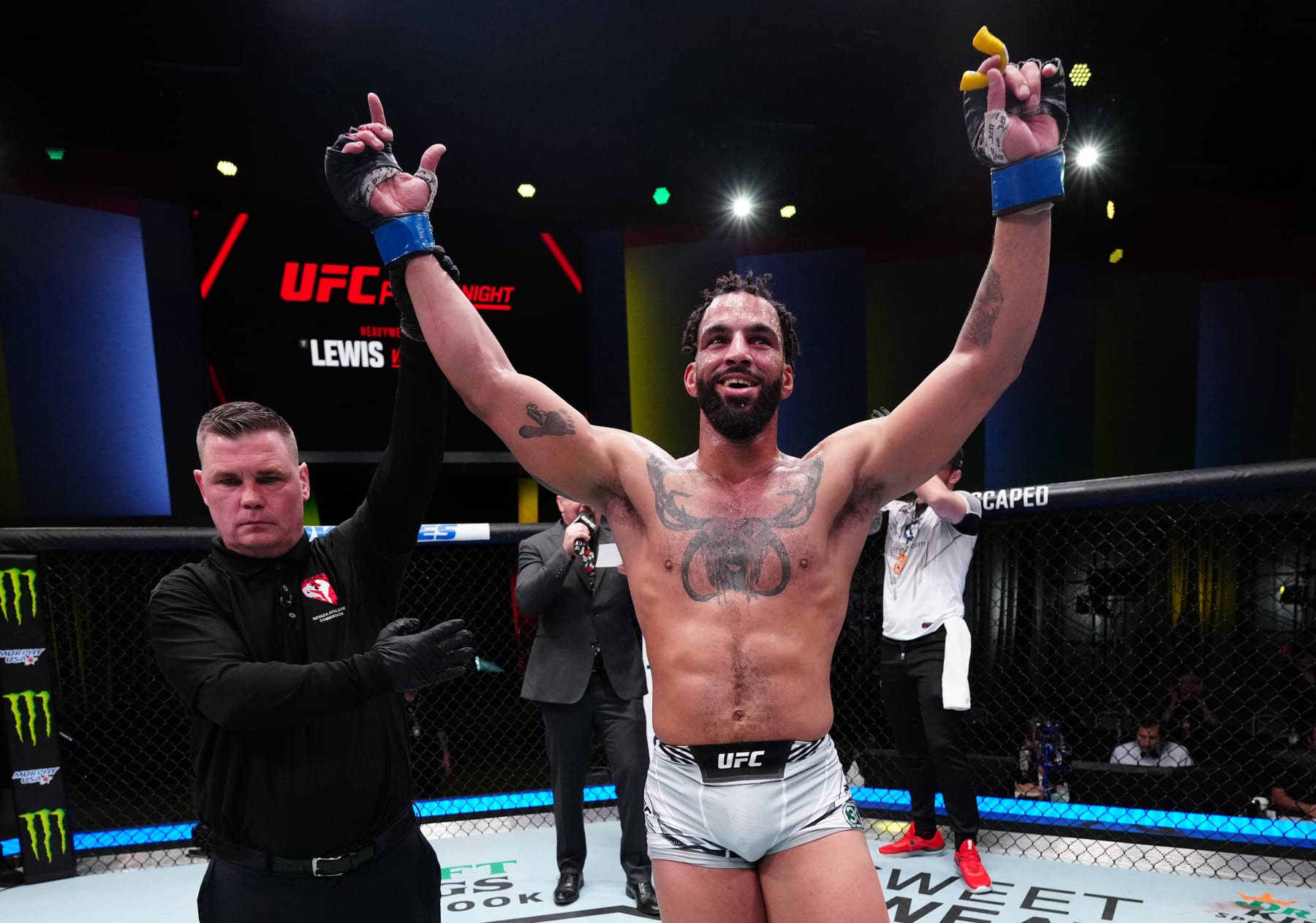 LAS VEGAS, NEVADA - FEBRUARY 04: Devin Clark reacts after his victory over Da Woon Jung of South Korea in a light heavyweight fight during the UFC Fight Night event at UFC APEX on February 04, 2023 in Las Vegas, Nevada. (Photo by Jeff Bottari/Zuffa LLC via Getty Images)