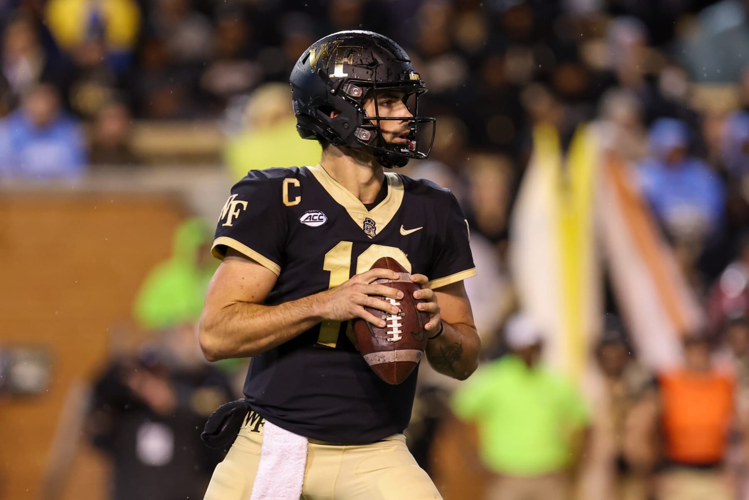 WINSTON-SALEM, NC - NOVEMBER 12: Sam Hartman (10) of the Wake Forest Demon Deacons looks to pass the ball during a football game between the Wake Forest Demon Deacons and the North Carolina Tar Heels on Nov 12, 2022 at Truist Field in Winston-Salem, NC. (Photo by David Jensen/Icon Sportswire via Getty Images) WINSTON-SALEM, NC - NOVEMBER 12: Sam Hartman (10) of the Wake Forest Demon Deacons looks to pass the ball during a football game between the Wake Forest Demon Deacons and the North Carolina Tar Heels on Nov 12, 2022 at Truist Field in Winston-Salem, NC. (Photo by David Jensen/Icon Sportswire via Getty Images)