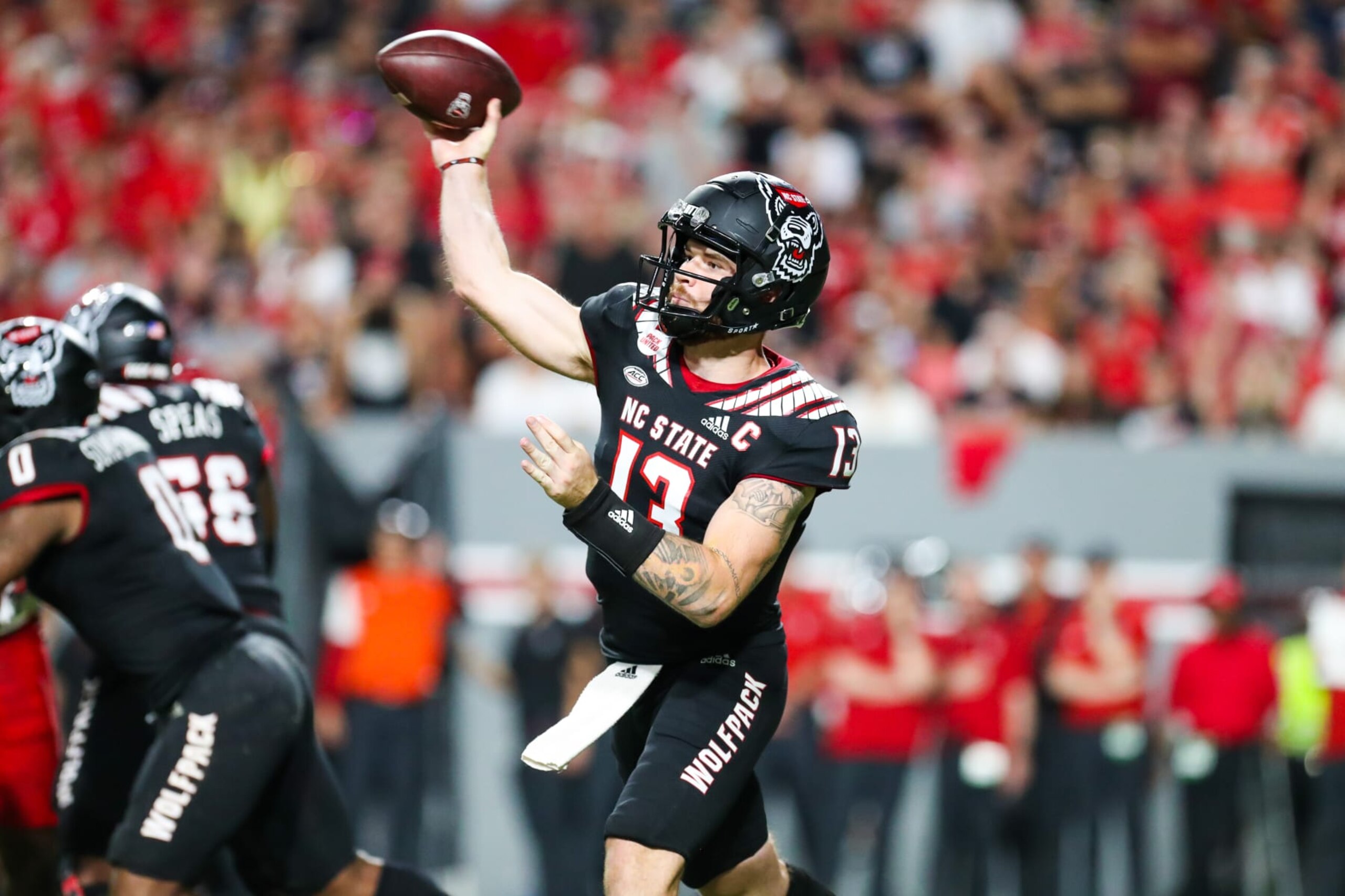 RALEIGH, NC - SEPTEMBER 17: Devin Leary (13) of the North Carolina State Wolfpack throws the ball during a football game between the North Carolina State Wolfpack and the Texas Tech Red Raiders on September 17, 2022, at Carter-Finley Stadium in Raleigh, NC. (Photo by David Jensen/Icon Sportswire via Getty Images) RALEIGH, NC - SEPTEMBER 17: Devin Leary (13) of the North Carolina State Wolfpack throws the ball during a football game between the North Carolina State Wolfpack and the Texas Tech Red Raiders on September 17, 2022, at Carter-Finley Stadium in Raleigh, NC. (Photo by David Jensen/Icon Sportswire via Getty Images)