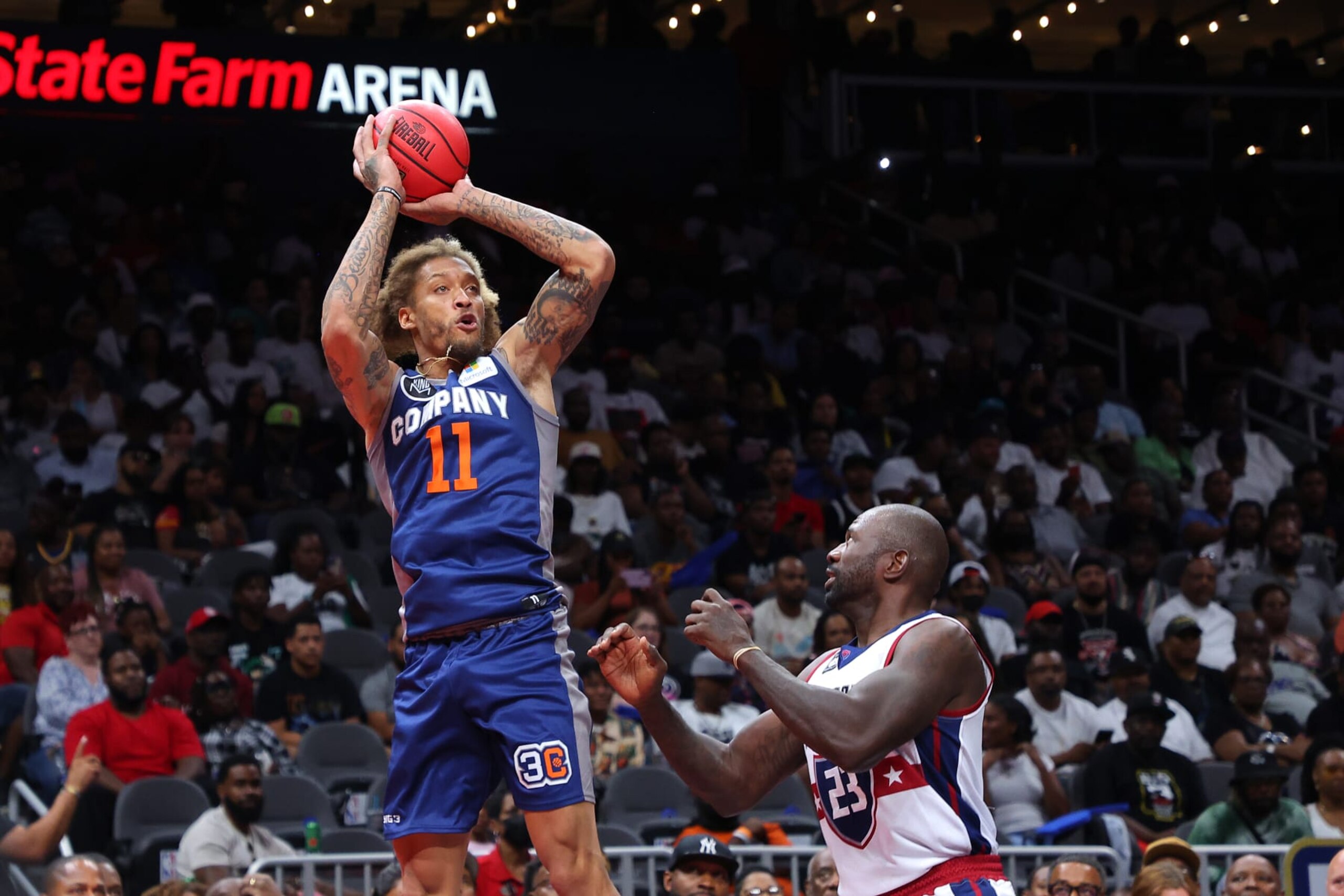 ATLANTA, GEORGIA - AUGUST 21: Michael Beasley #11 of 3's Company shoots against Jason Richardson #23 of the Tri-State during the All-Star game prior to the BIG3 Championship at State Farm Arena on August 21, 2022 in Atlanta, Georgia. (Photo by Kevin C. Cox/Getty Images for BIG3)