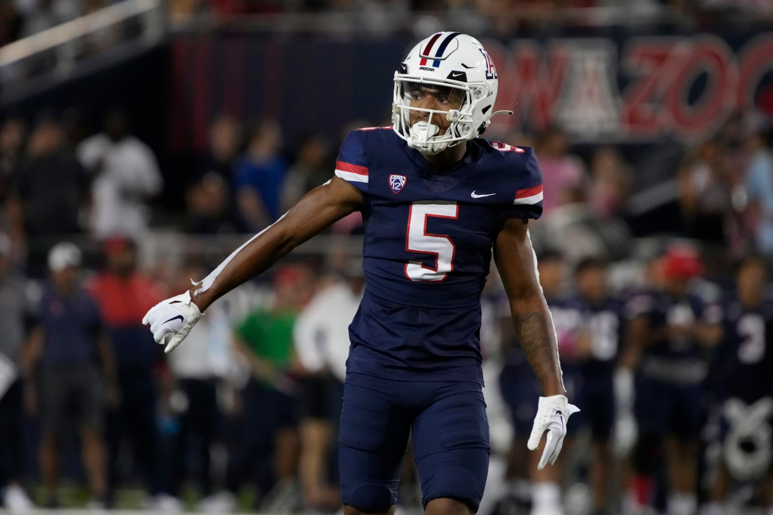 Arizona wide receiver Dorian Singer (5) in the first half during an NCAA college football game against Colorado, Saturday, Oct. 1, 2022, in Tucson, Ariz. (AP Photo/Rick Scuteri) Arizona wide receiver Dorian Singer (5) in the first half during an NCAA college football game against Colorado, Saturday, Oct. 1, 2022, in Tucson, Ariz. (AP Photo/Rick Scuteri)