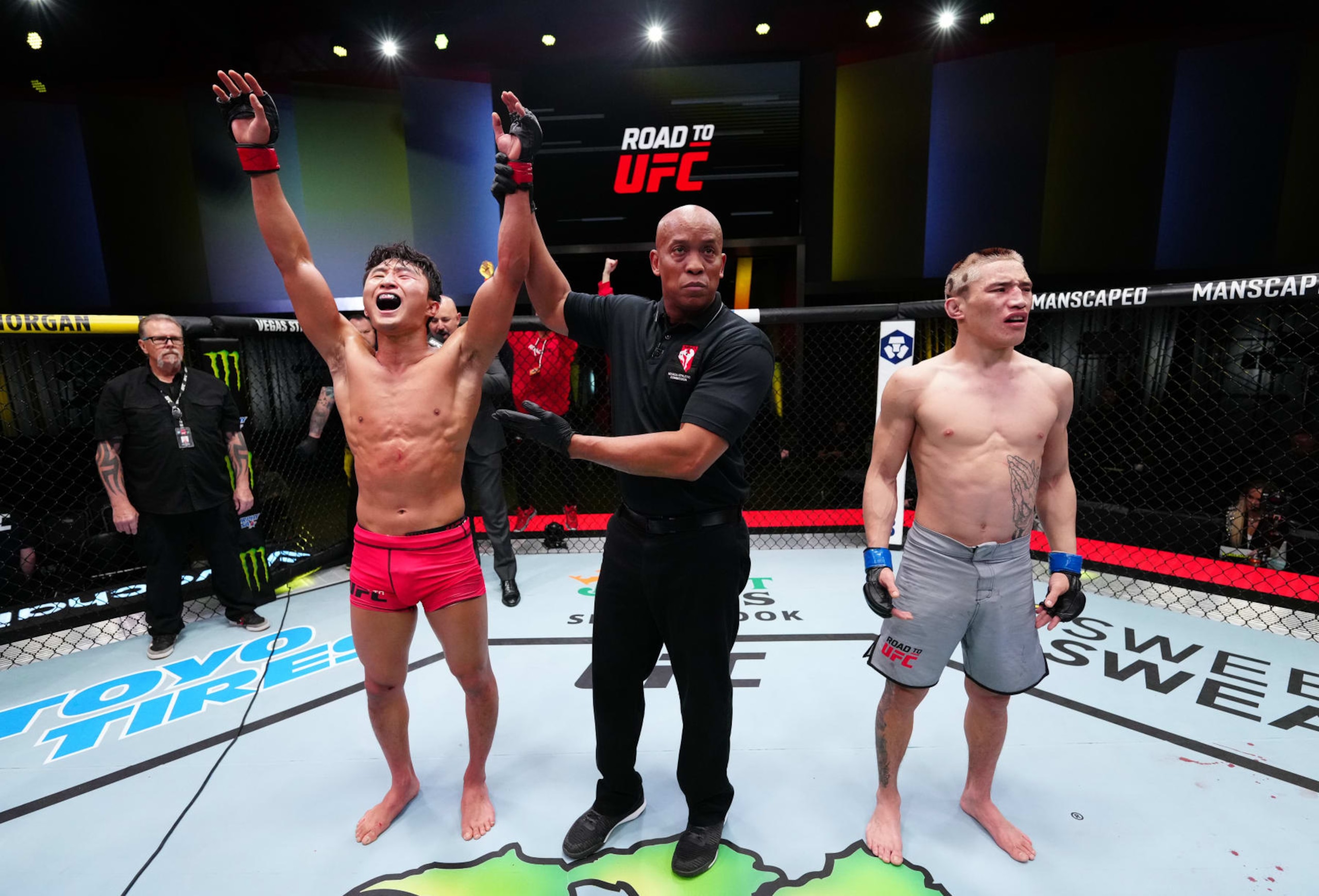 LAS VEGAS, NEVADA - FEBRUARY 04: JeongYeong Lee of South Korea reacts after his split-decision victory over Yi Zha of China in a featherweight fight during the UFC Fight Night event at UFC APEX on February 04, 2023 in Las Vegas, Nevada. (Photo by Jeff Bottari/Zuffa LLC via Getty Images)