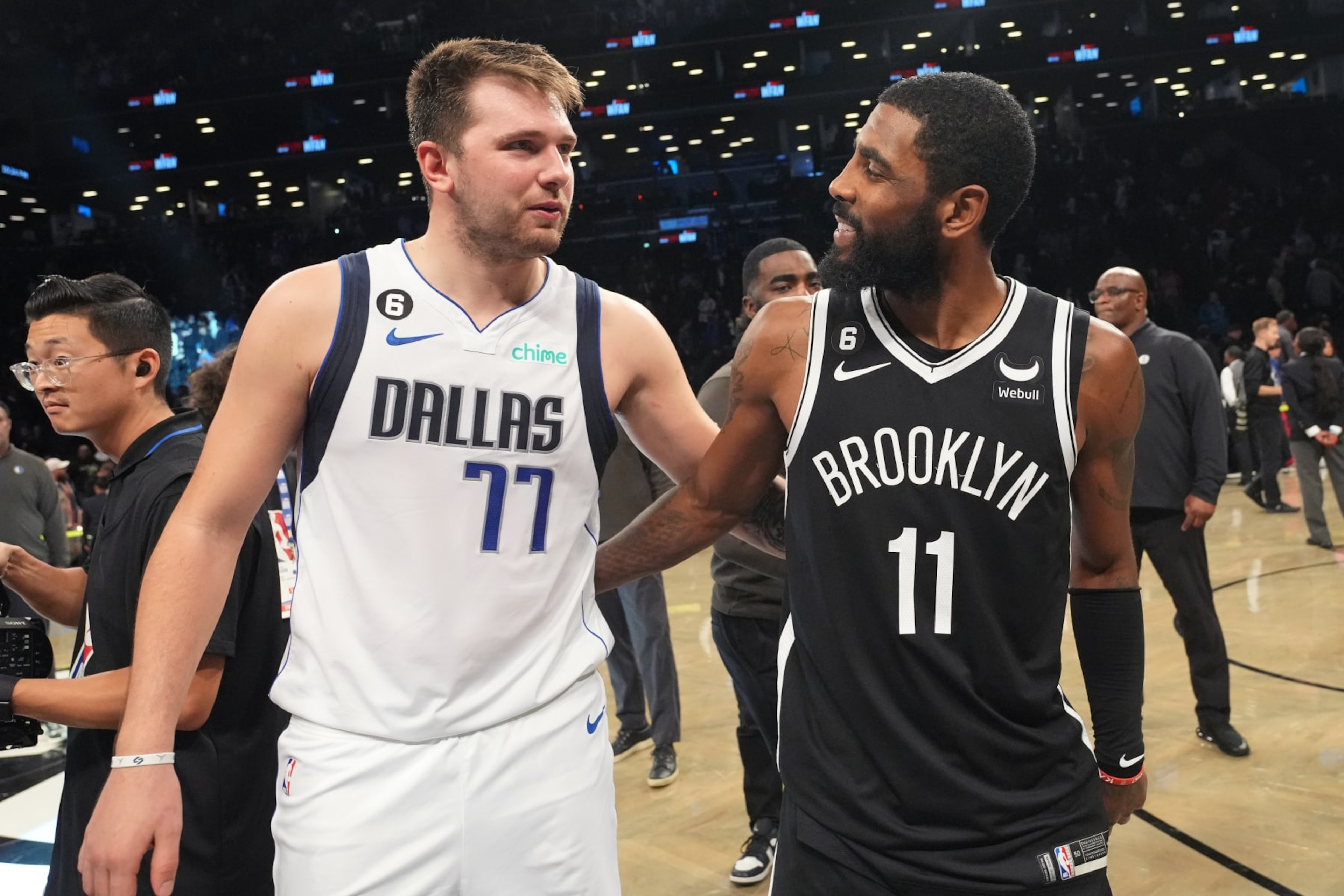 BROOKLYN, NY - OCTOBER 27: Luka Doncic #77 of the Dallas Mavericks talks to Kyrie Irving #11 of the Brooklyn Nets after the game on October 27, 2022 at Barclays Center in Brooklyn, New York. NOTE TO USER: User expressly acknowledges and agrees that, by downloading and or using this Photograph, user is consenting to the terms and conditions of the Getty Images License Agreement. Mandatory Copyright Notice: Copyright 2022 NBAE (Photo by Jesse D. Garrabrant/NBAE via Getty Images)