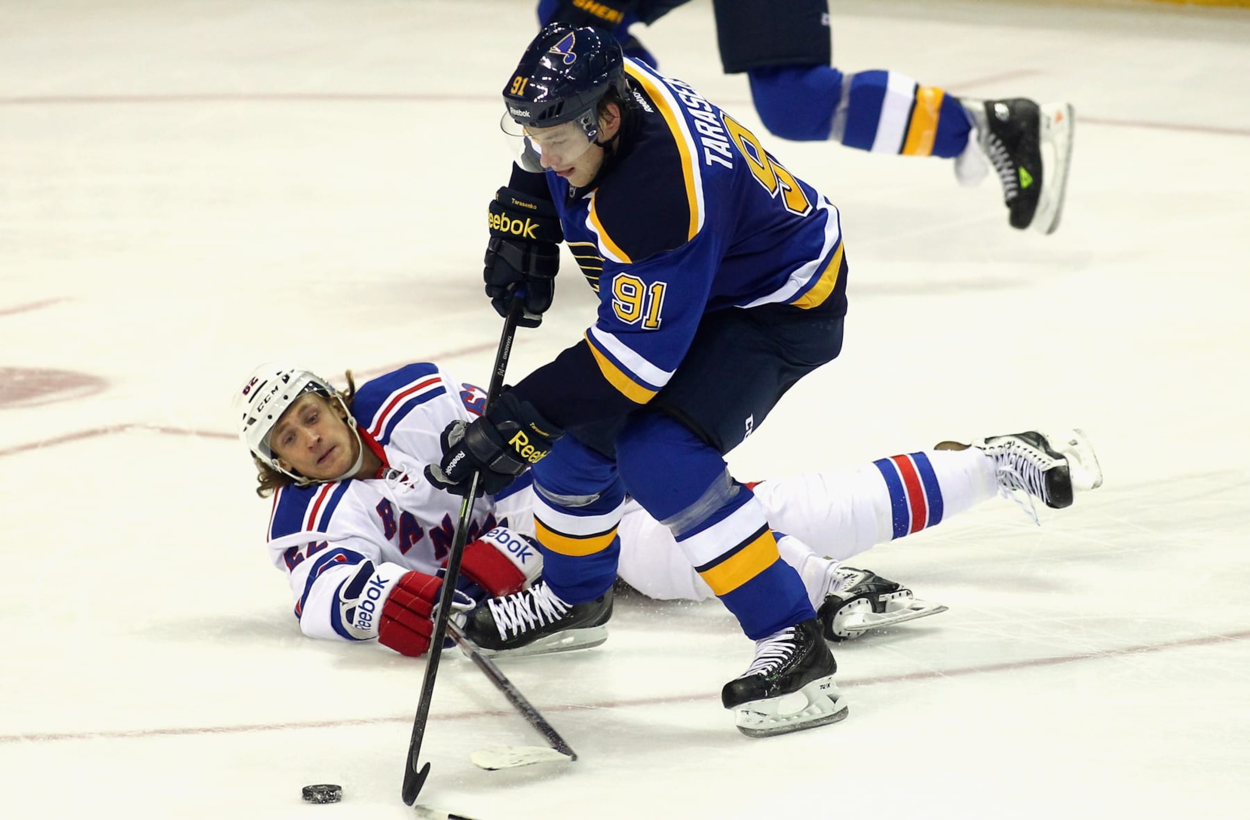 ST. LOUIS, MO - OCTOBER 09:  Vladimir Tarasenko #91 of the St. Louis Blues plays in the game against Carl Hagelin #62 of the New York Rangers at the Scottrade Center on October 9, 2014 in St. Louis, Missouri.  (Photo by Tim Umphrey/NHLI via Getty Images)