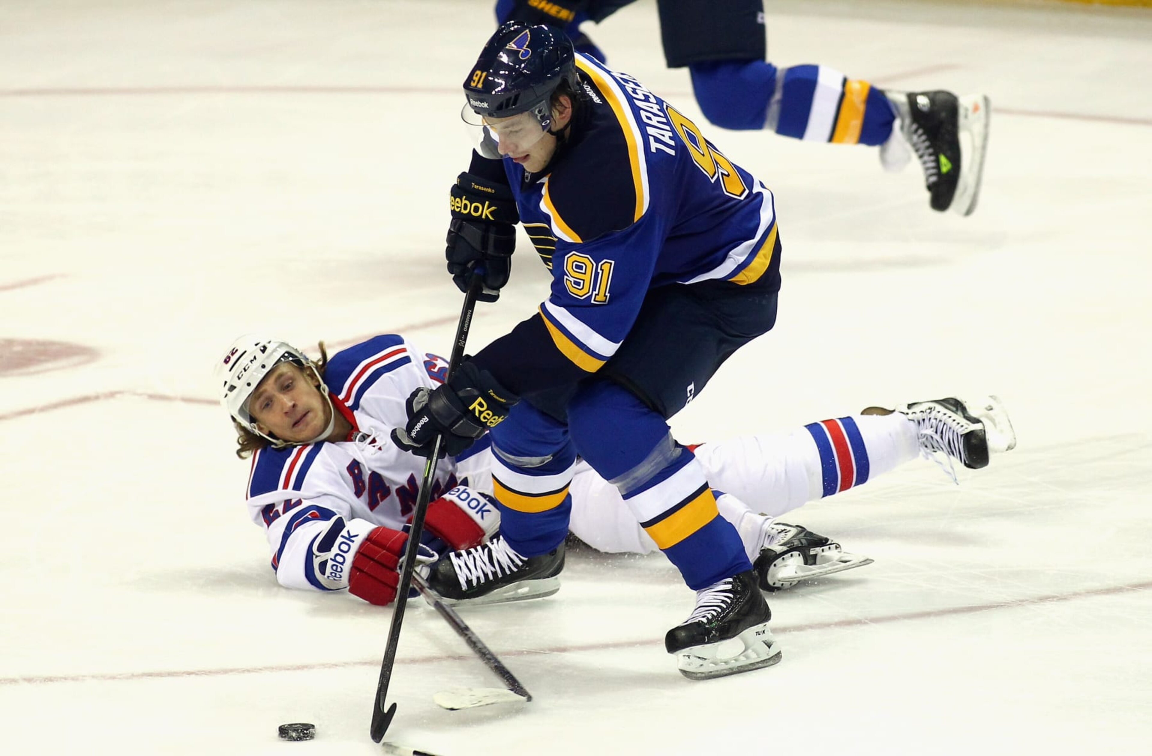 ST. LOUIS, MO - OCTOBER 09:  Vladimir Tarasenko #91 of the St. Louis Blues plays in the game against Carl Hagelin #62 of the New York Rangers at the Scottrade Center on October 9, 2014 in St. Louis, Missouri.  (Photo by Tim Umphrey/NHLI via Getty Images)