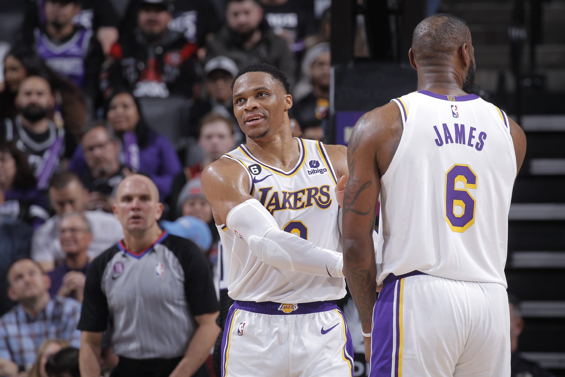SACRAMENTO, CA - JANUARY 7: Russell Westbrook #0 and LeBron James #6 of the Los Angeles Lakers shake hands during the game against the Sacramento Kings on January 7, 2023 at Golden 1 Center in Sacramento, California. NOTE TO USER: User expressly acknowledges and agrees that, by downloading and or using this photograph, User is consenting to the terms and conditions of the Getty Images Agreement. Mandatory Copyright Notice: Copyright 2023 NBAE (Photo by Rocky Widner/NBAE via Getty Images)