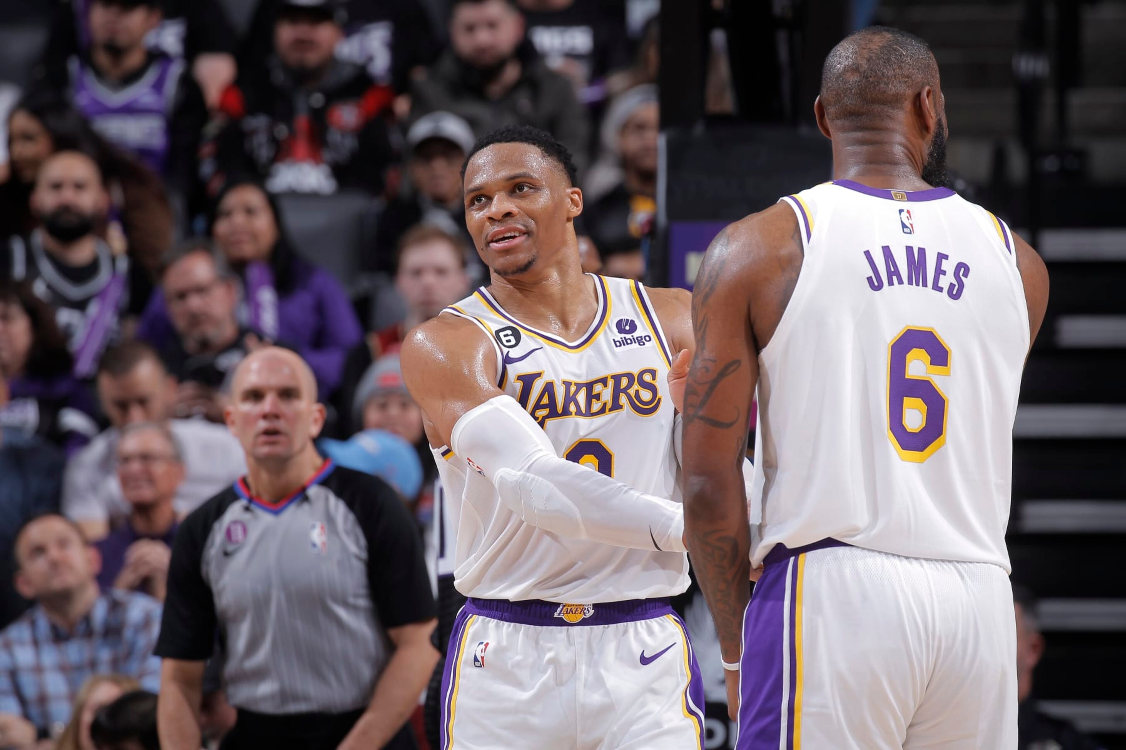 SACRAMENTO, CA - JANUARY 7: Russell Westbrook #0 and LeBron James #6 of the Los Angeles Lakers shake hands during the game against the Sacramento Kings on January 7, 2023 at Golden 1 Center in Sacramento, California. NOTE TO USER: User expressly acknowledges and agrees that, by downloading and or using this photograph, User is consenting to the terms and conditions of the Getty Images Agreement. Mandatory Copyright Notice: Copyright 2023 NBAE (Photo by Rocky Widner/NBAE via Getty Images)