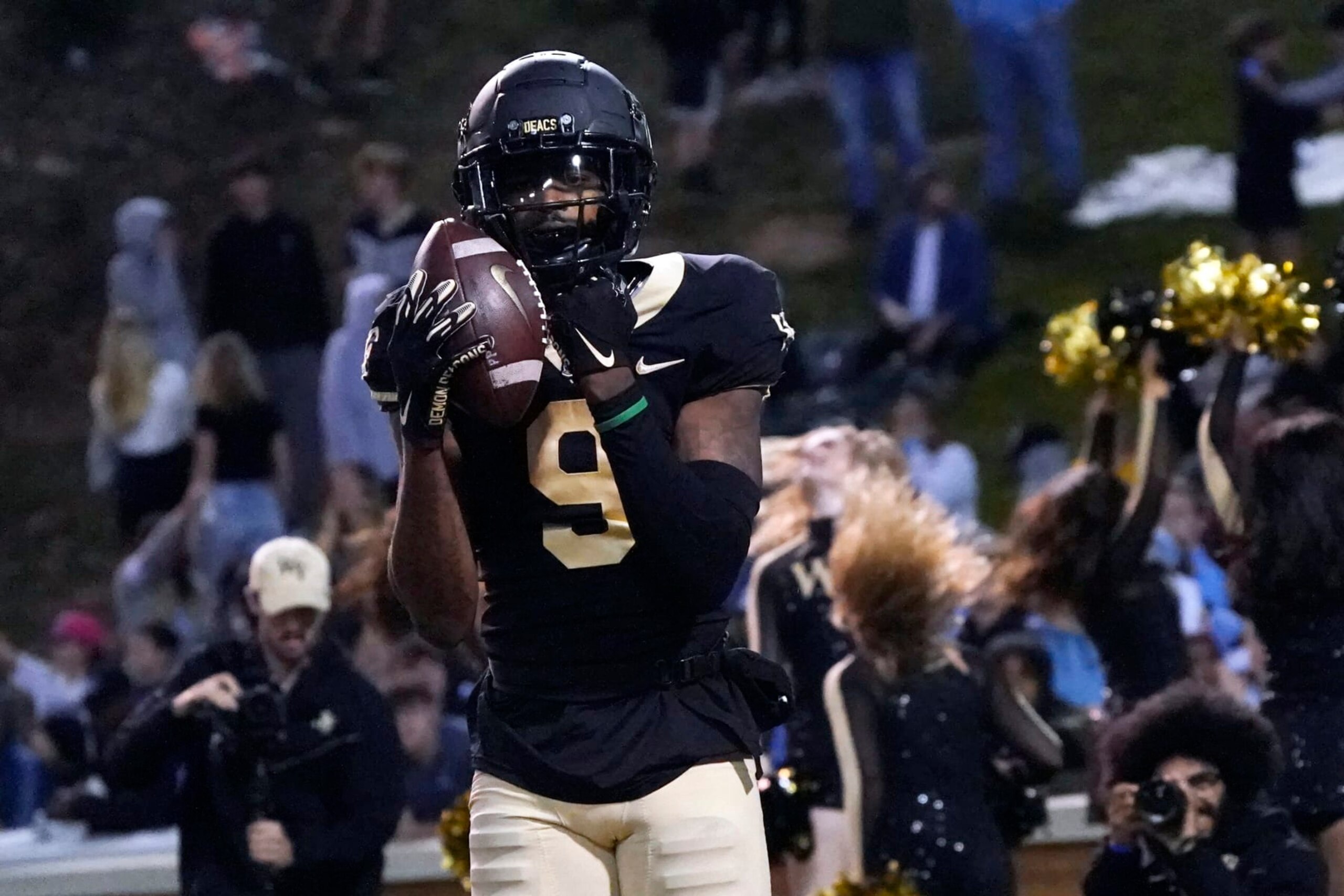 Wake Forest wide receiver A.T. Perry (9) celebrates his touchdown catch against North Carolina during the second half of an NCAA college football game in Winston-Salem, N.C., Saturday, Nov. 12, 2022. (AP Photo/Chuck Burton)