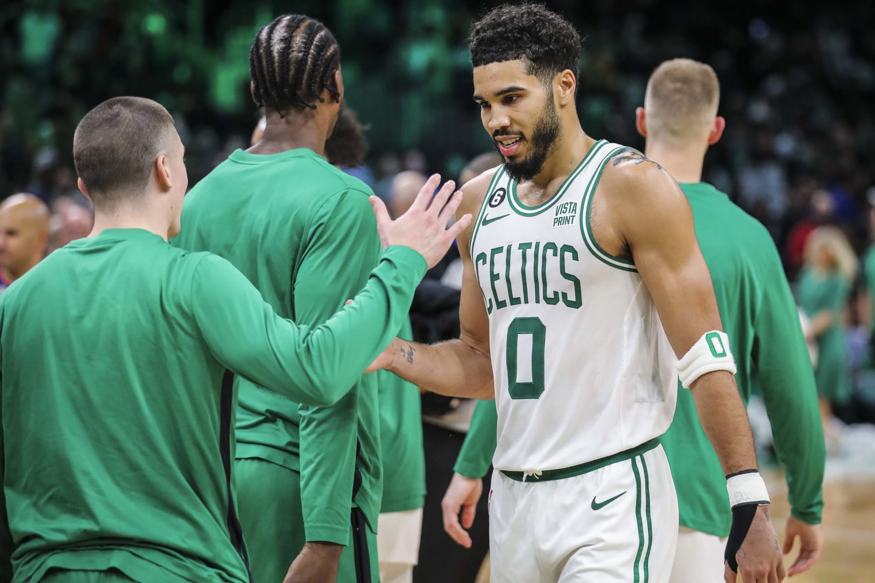 Boston, MA - November 30: Boston Celtics SF Jayson Tatum high fives teammate Payton Pritchard after the Celtics 134-121 win over the Miami Heat. (Photo by Erin Clark/The Boston Globe via Getty Images)