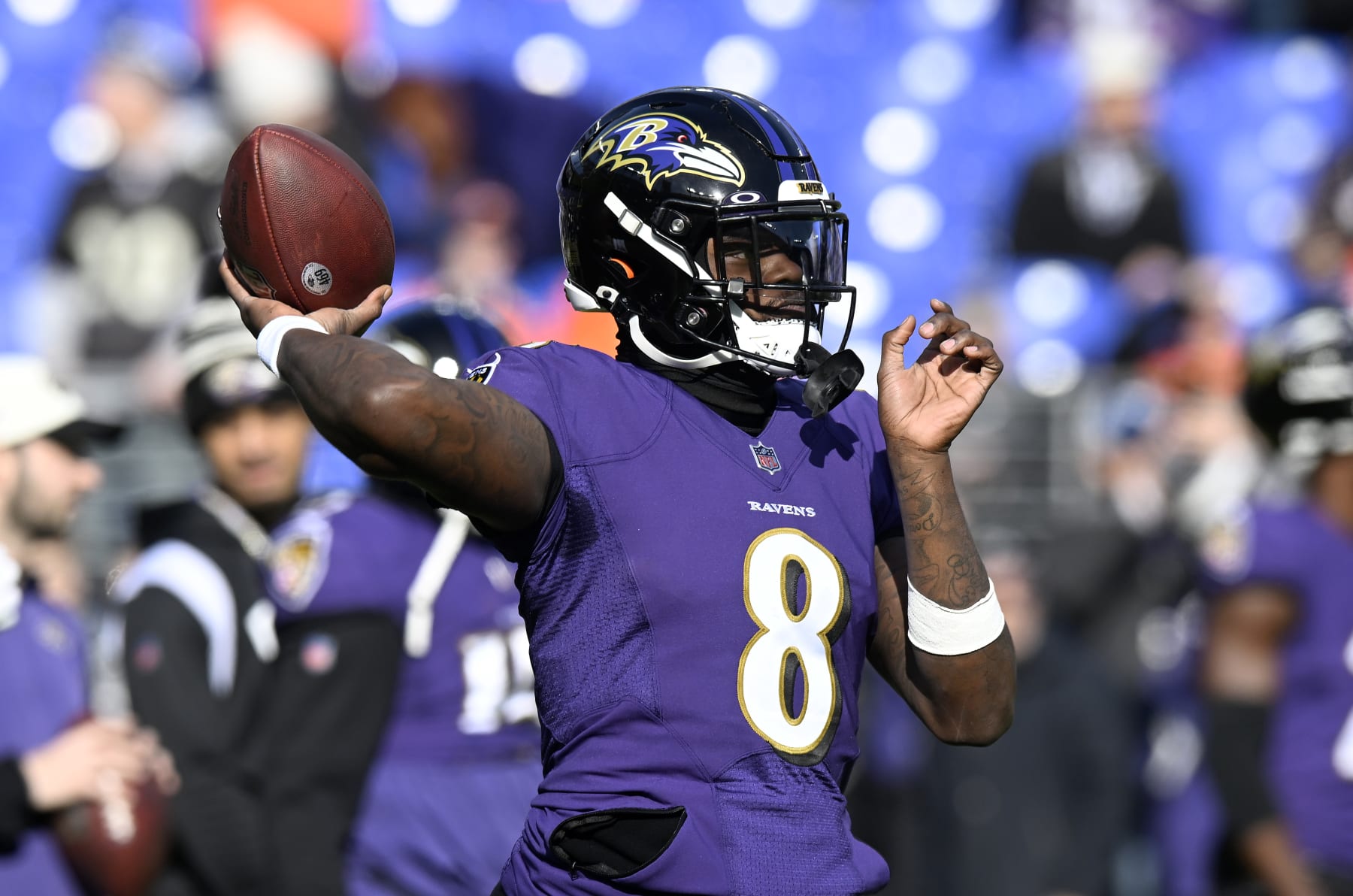BALTIMORE, MARYLAND - DECEMBER 04: Lamar Jackson #8 of the Baltimore Ravens warms up before the game against the Denver Broncos at M&T Bank Stadium on December 04, 2022 in Baltimore, Maryland. (Photo by G Fiume/Getty Images)