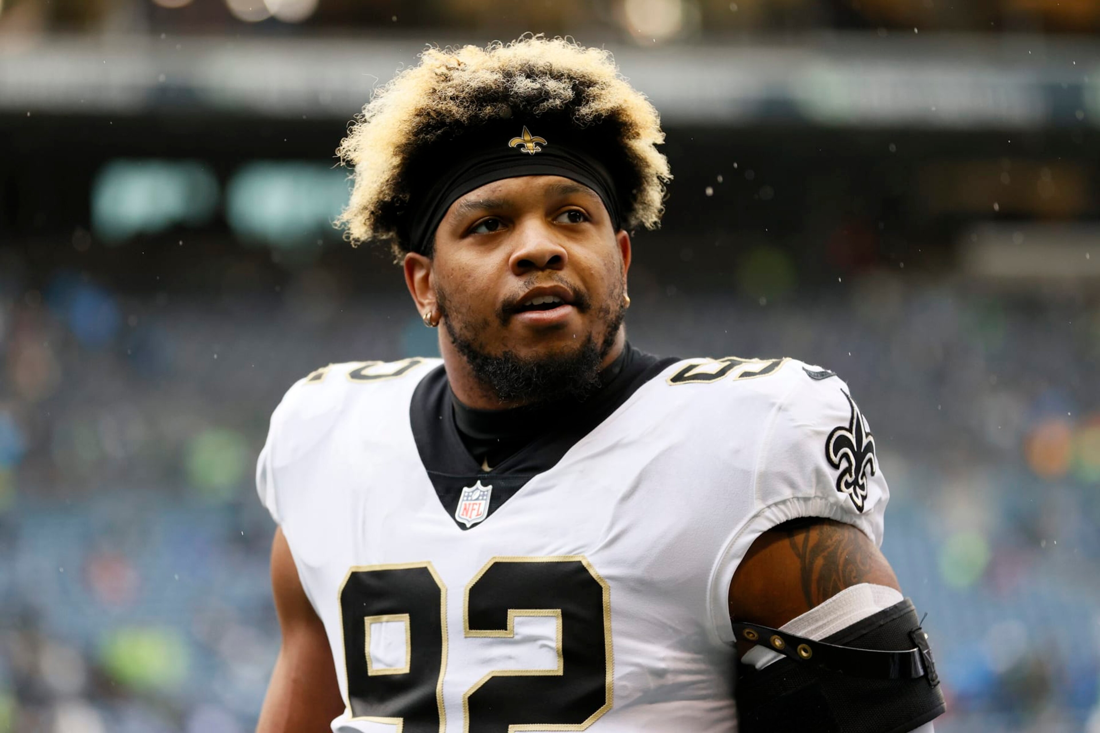 SEATTLE, WASHINGTON - OCTOBER 25: Marcus Davenport #92 of the New Orleans Saints looks on before the game against the Seattle Seahawks at Lumen Field on October 25, 2021 in Seattle, Washington. (Photo by Steph Chambers/Getty Images) SEATTLE, WASHINGTON - OCTOBER 25: Marcus Davenport #92 of the New Orleans Saints looks on before the game against the Seattle Seahawks at Lumen Field on October 25, 2021 in Seattle, Washington. (Photo by Steph Chambers/Getty Images)