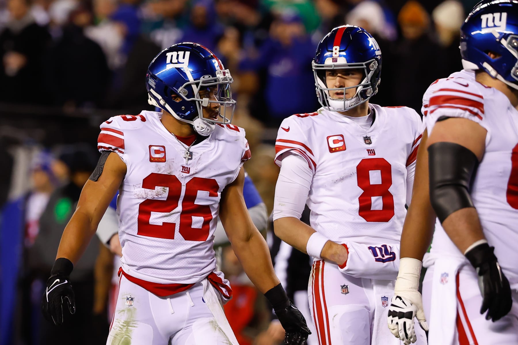 PHILADELPHIA, PA - JANUARY 21:  New York Giants running back Saquon Barkley (26) and New York Giants quarterback Daniel Jones (8) during the NFC Divisional playoff game between the Philadelphia Eagles and the New York Giants on January 21, 2023 at Lincoln Financial Field in Philadelphia, Pennsylvania.  (Photo by Rich Graessle/Icon Sportswire via Getty Images)