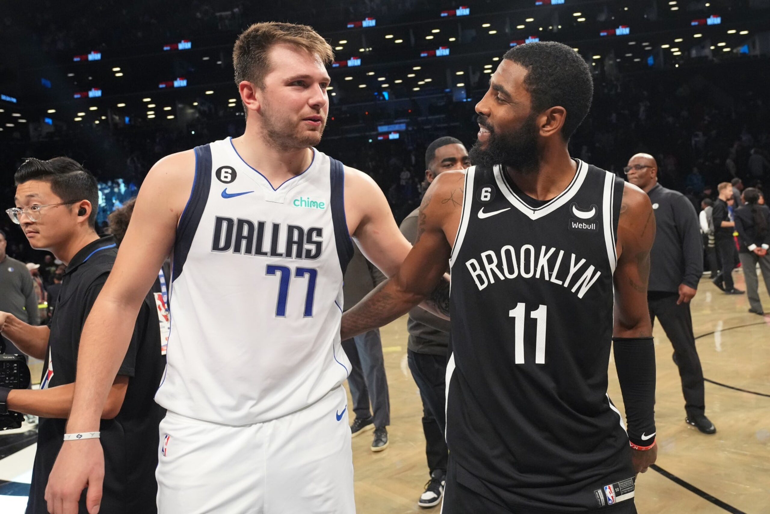BROOKLYN, NY - OCTOBER 27: Luka Doncic #77 of the Dallas Mavericks talks to Kyrie Irving #11 of the Brooklyn Nets after the game on October 27, 2022 at Barclays Center in Brooklyn, New York. NOTE TO USER: User expressly acknowledges and agrees that, by downloading and or using this Photograph, user is consenting to the terms and conditions of the Getty Images License Agreement. Mandatory Copyright Notice: Copyright 2022 NBAE (Photo by Jesse D. Garrabrant/NBAE via Getty Images)