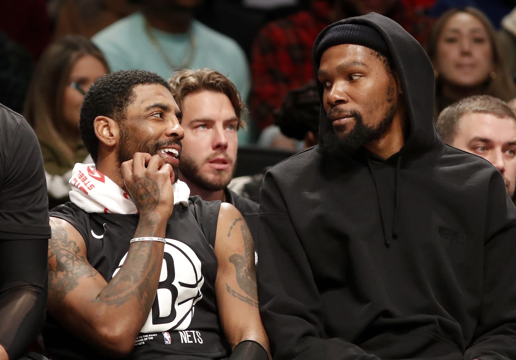 NEW YORK, NEW YORK - JANUARY 30: (NEW YORK DAILIES OUT)  Kyrie Irving #11 (L) and Kevin Durant #7 of the Brooklyn Nets look on against the Los Angeles Lakers at Barclays Center on January 30, 2023 in New York City. The Nets defeated the Lakers 121-104. NOTE TO USER: User expressly acknowledges and agrees that, by downloading and or using this photograph, User is consenting to the terms and conditions of the Getty Images License Agreement. (Photo by Jim McIsaac/Getty Images)