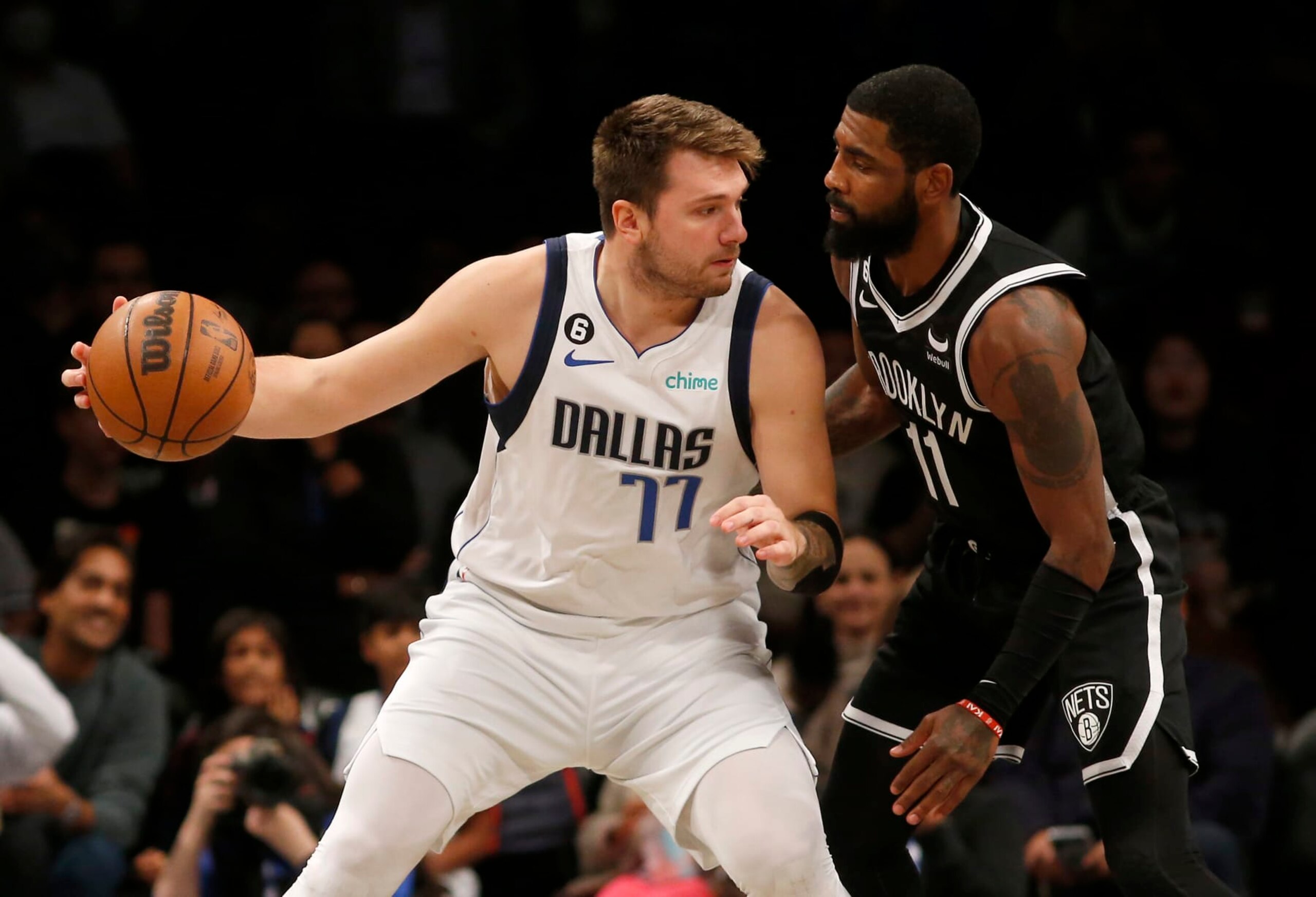 NEW YORK, NEW YORK - OCTOBER 27: (NEW YORK DAILIES OUT)  Luka Doncic #77 of the Dallas Mavericks in action against Kyrie Irving #11 of the Brooklyn Nets at Barclays Center on October 27, 2022 in New York City. The Mavericks defeated the Nets 129-125 in overtime. NOTE TO USER: User expressly acknowledges and agrees that, by downloading and or using this photograph, User is consenting to the terms and conditions of the Getty Images License Agreement. (Photo by Jim McIsaac/Getty Images)