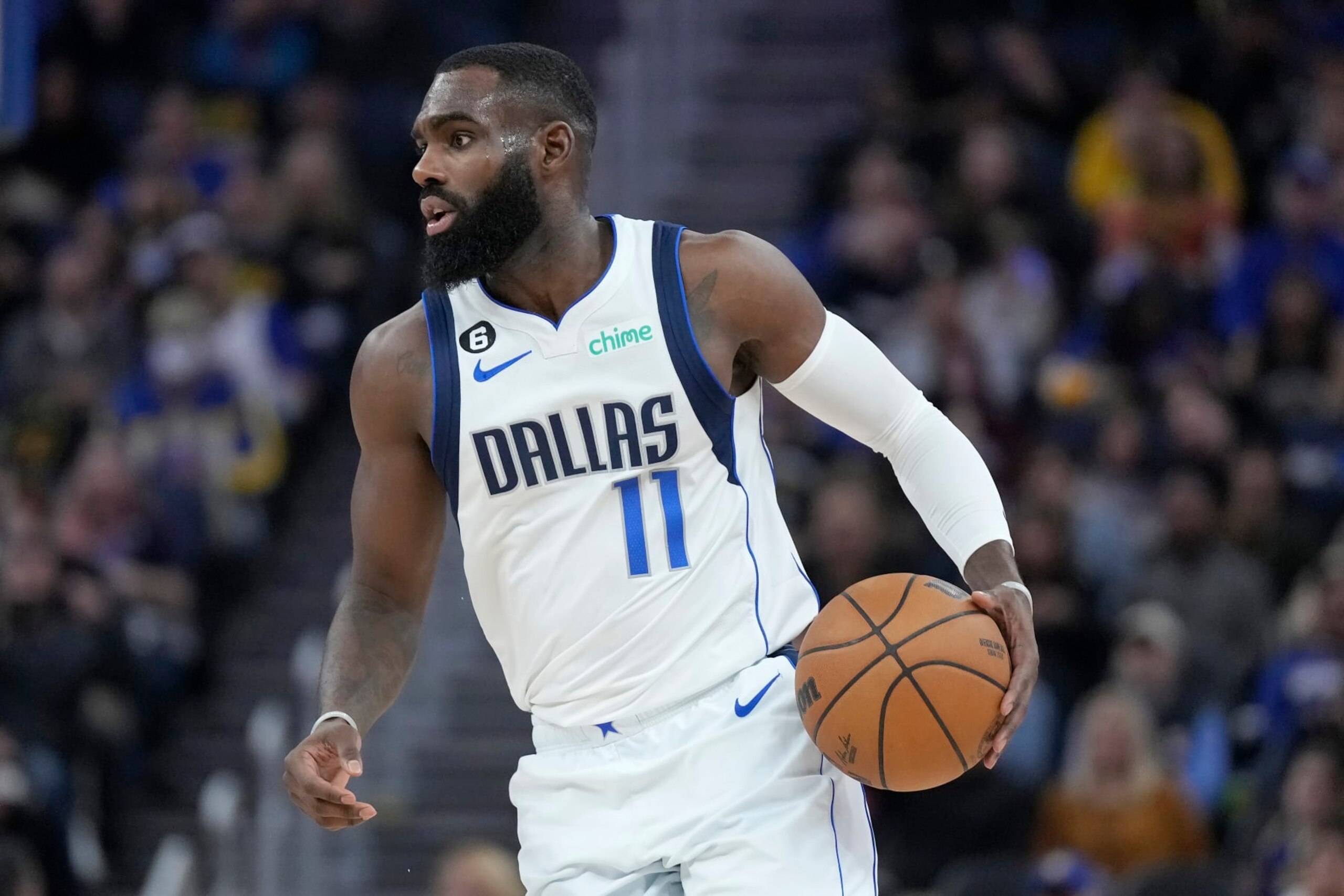 Dallas Mavericks forward Tim Hardaway Jr. (11) brings the ball up the court against the Golden State Warriors during the first half of an NBA basketball game in San Francisco, Saturday, Feb. 4, 2023. (AP Photo/Jeff Chiu)