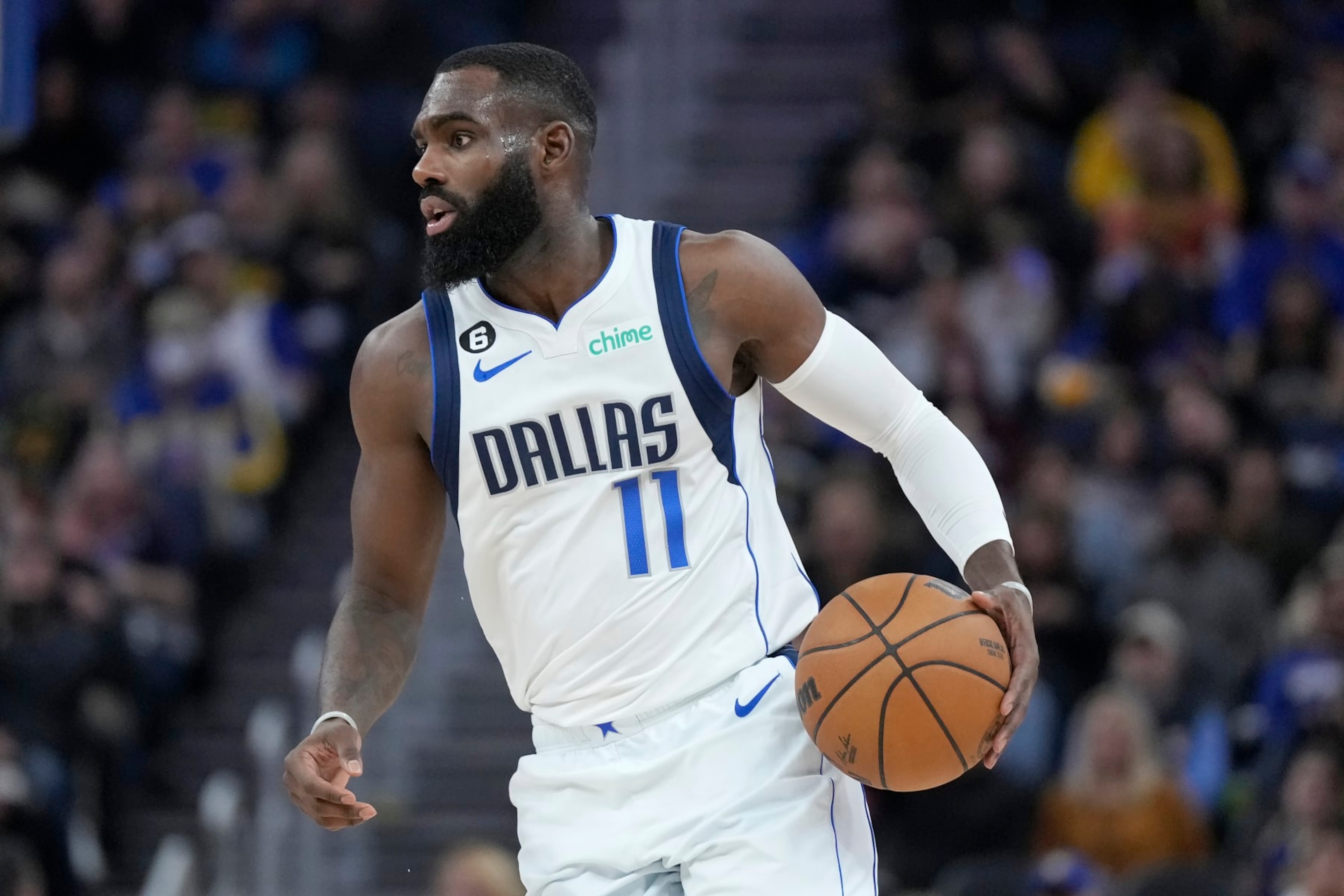 Dallas Mavericks forward Tim Hardaway Jr. (11) brings the ball up the court against the Golden State Warriors during the first half of an NBA basketball game in San Francisco, Saturday, Feb. 4, 2023. (AP Photo/Jeff Chiu)