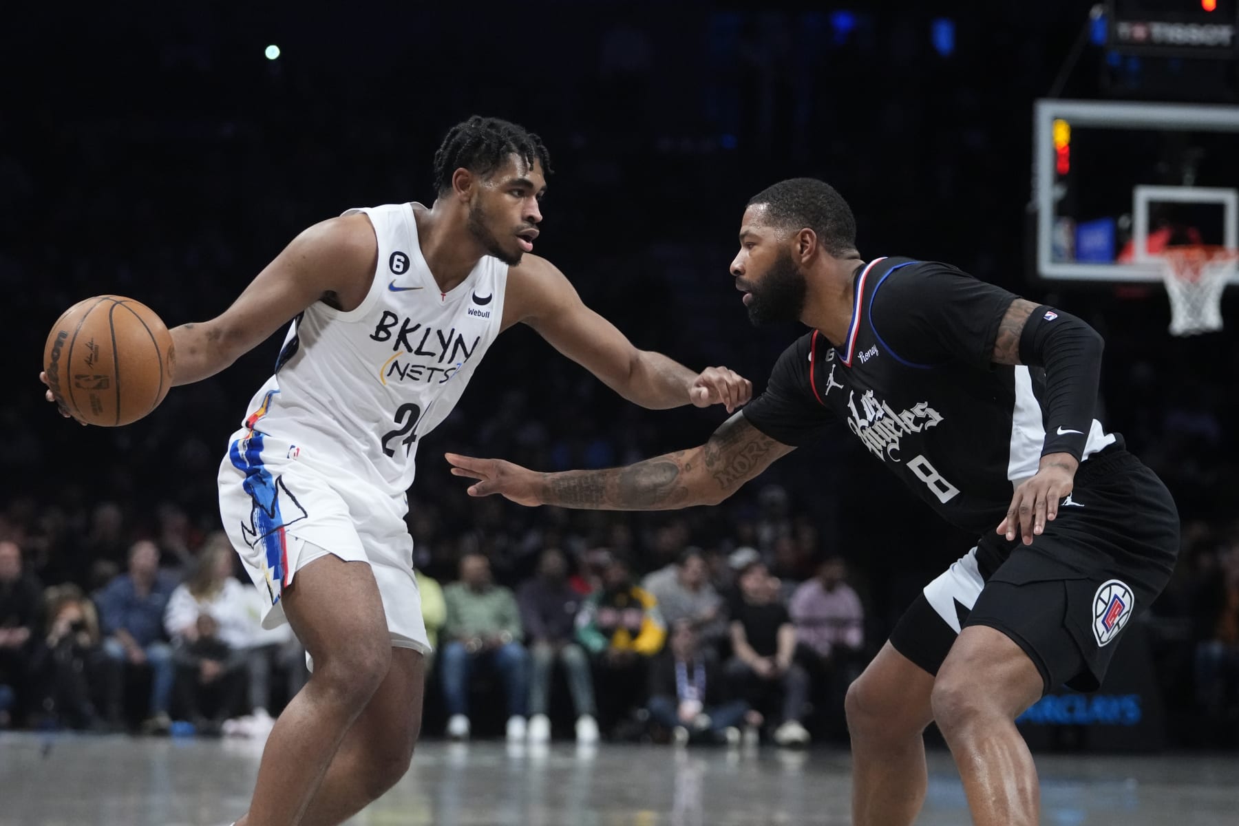 Los Angeles Clippers' Marcus Morris Sr. (8) defends against Brooklyn Nets' Cam Thomas (24) during the first half of an NBA basketball game Monday, Feb. 6, 2023, in New York. (AP Photo/Frank Franklin II)