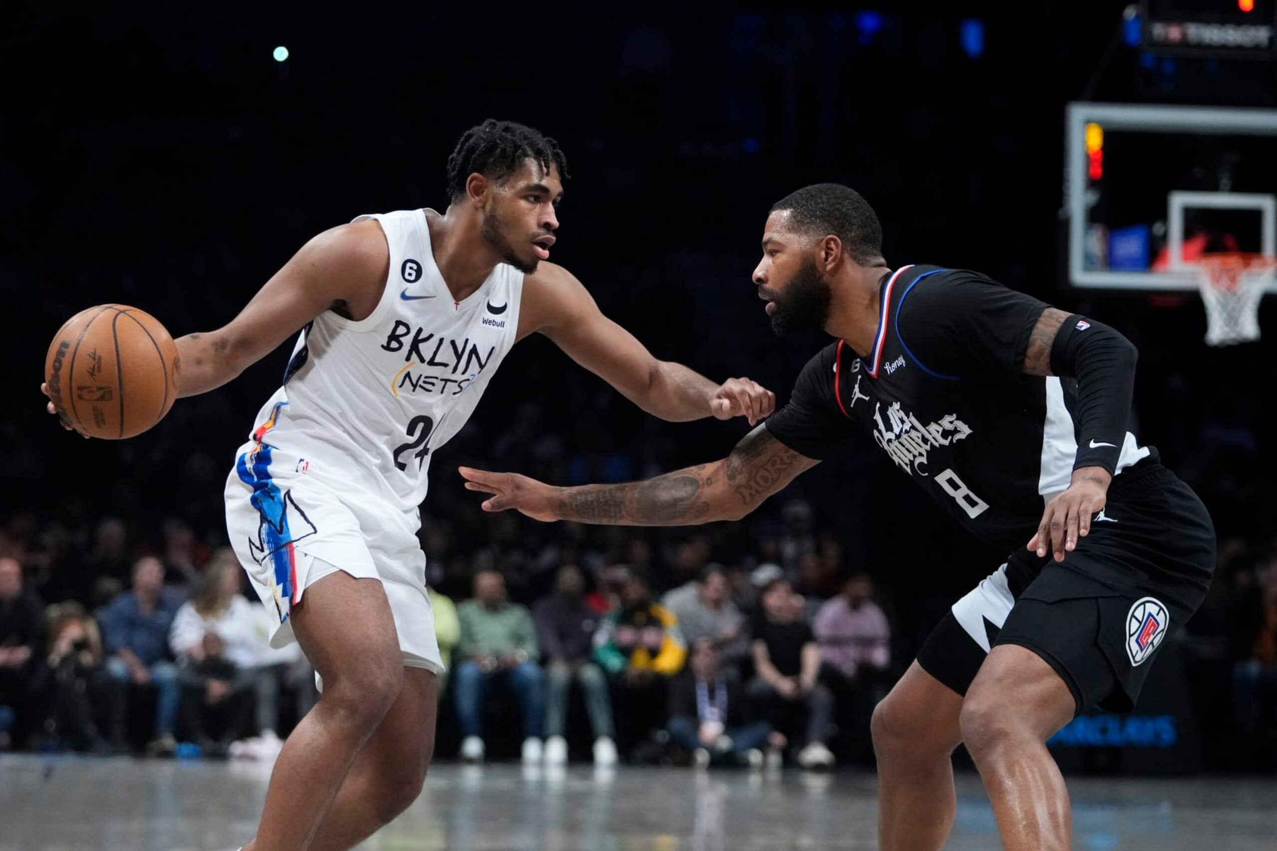 Los Angeles Clippers' Marcus Morris Sr. (8) defends against Brooklyn Nets' Cam Thomas (24) during the first half of an NBA basketball game Monday, Feb. 6, 2023, in New York. (AP Photo/Frank Franklin II) Los Angeles Clippers' Marcus Morris Sr. (8) defends against Brooklyn Nets' Cam Thomas (24) during the first half of an NBA basketball game Monday, Feb. 6, 2023, in New York. (AP Photo/Frank Franklin II)